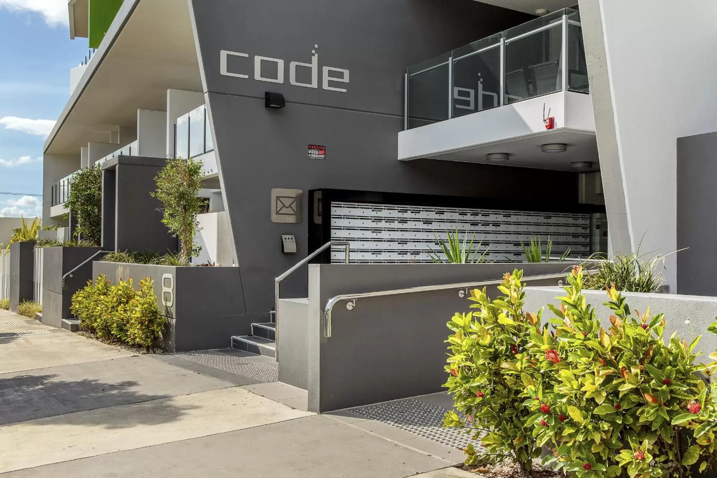 Facade/entrance in Code Apartments Facade/entrance in Code Apartments