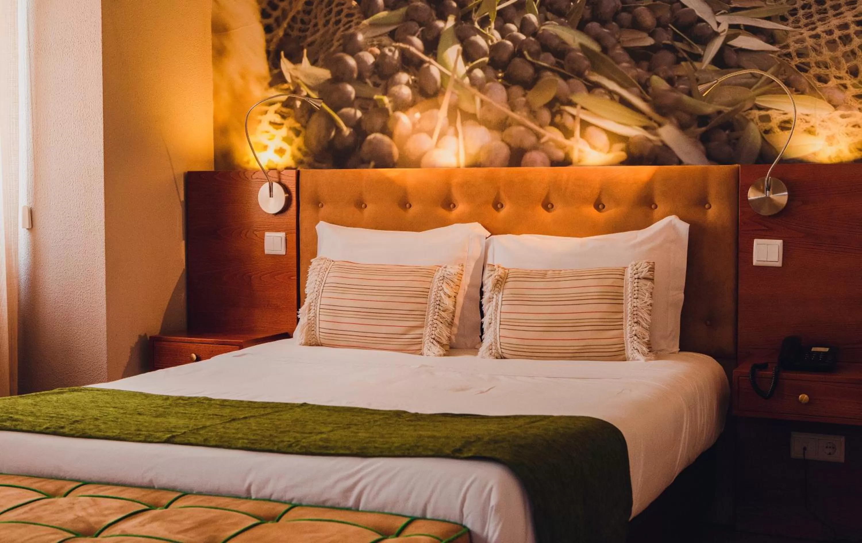 Bed in Hotel Império do Rei