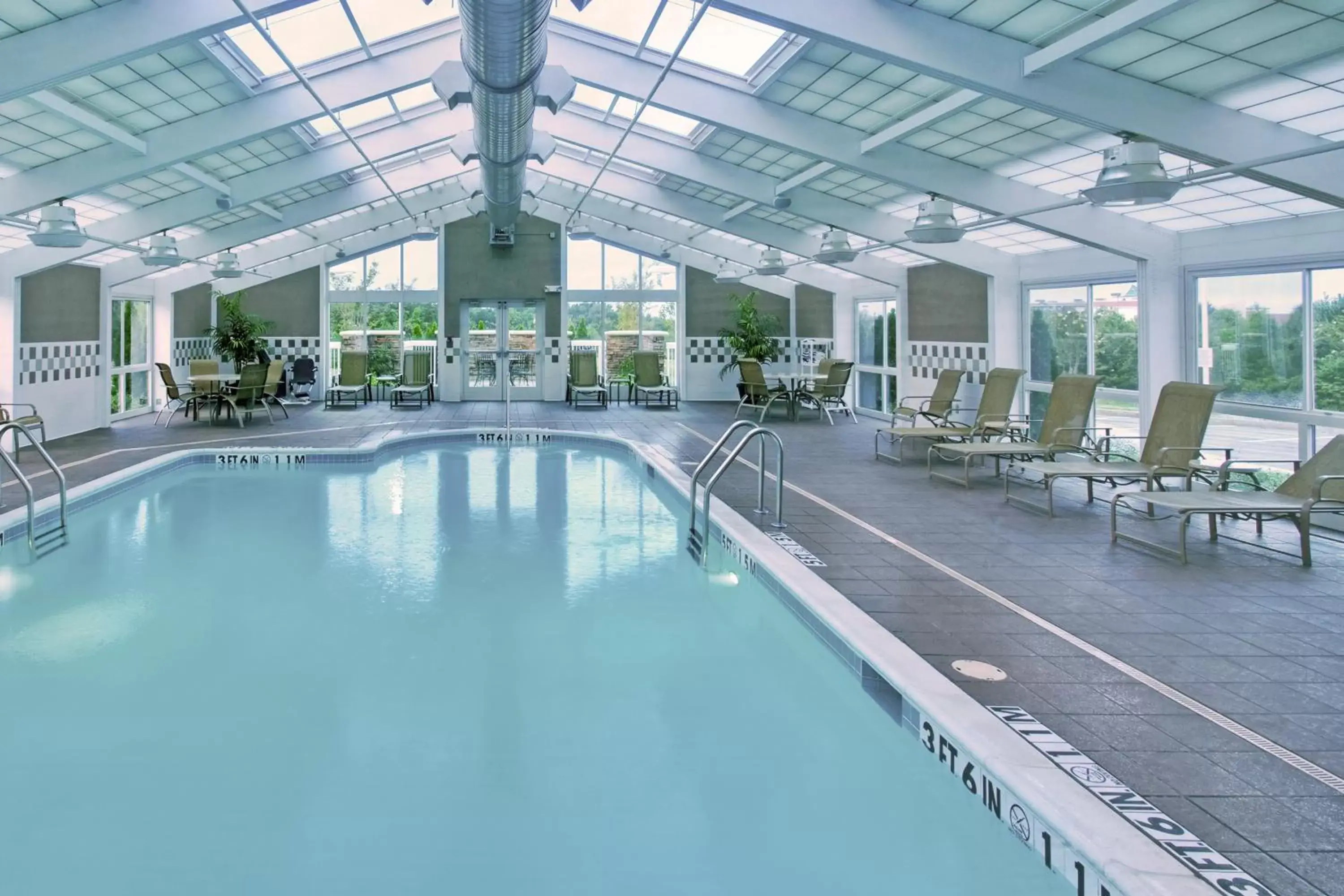 Swimming Pool in Holiday Inn Hotel & Suites Memphis-Wolfchase Galleria, an IHG Hotel