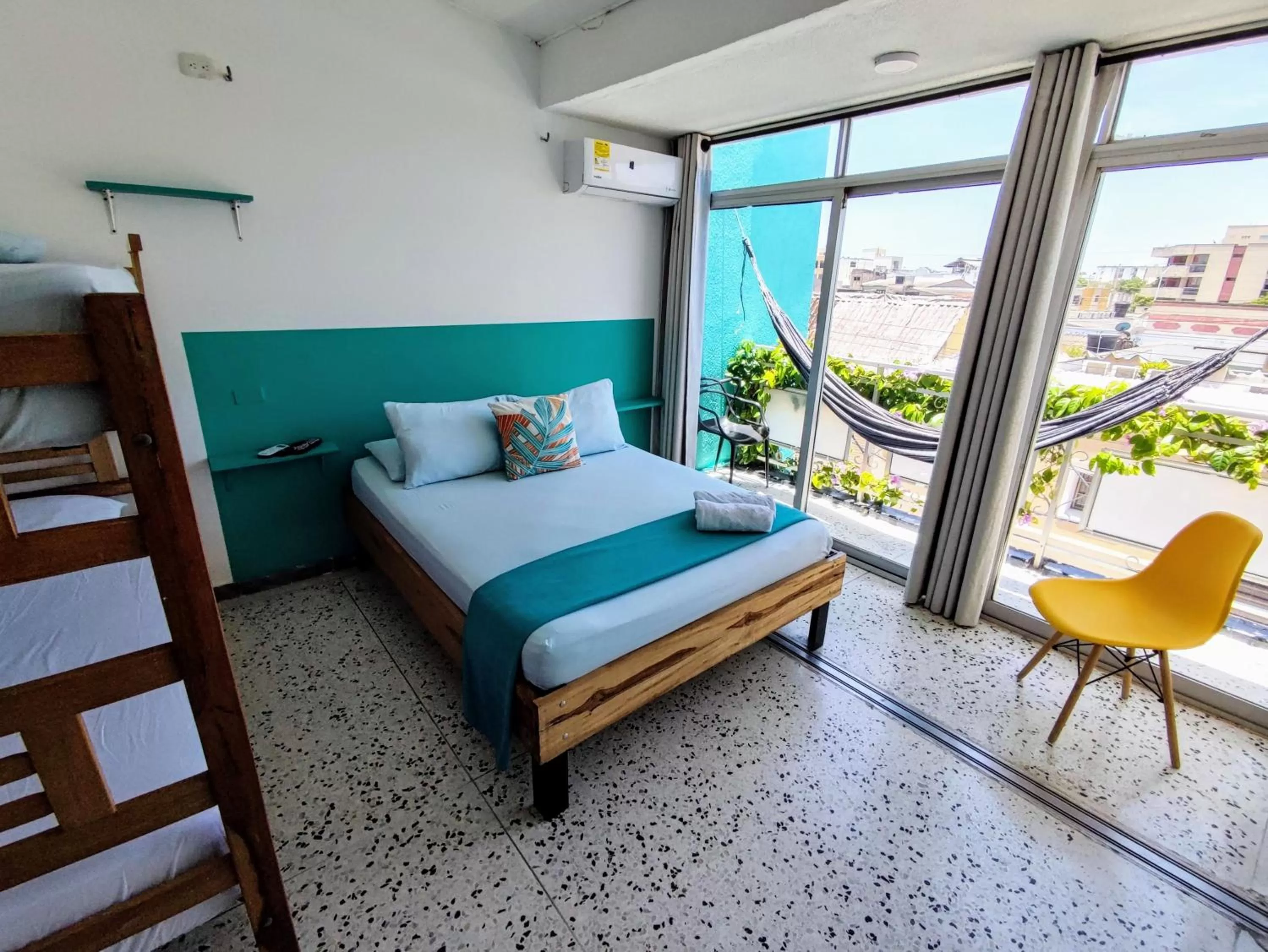 Bed in Bona Vida Hotel