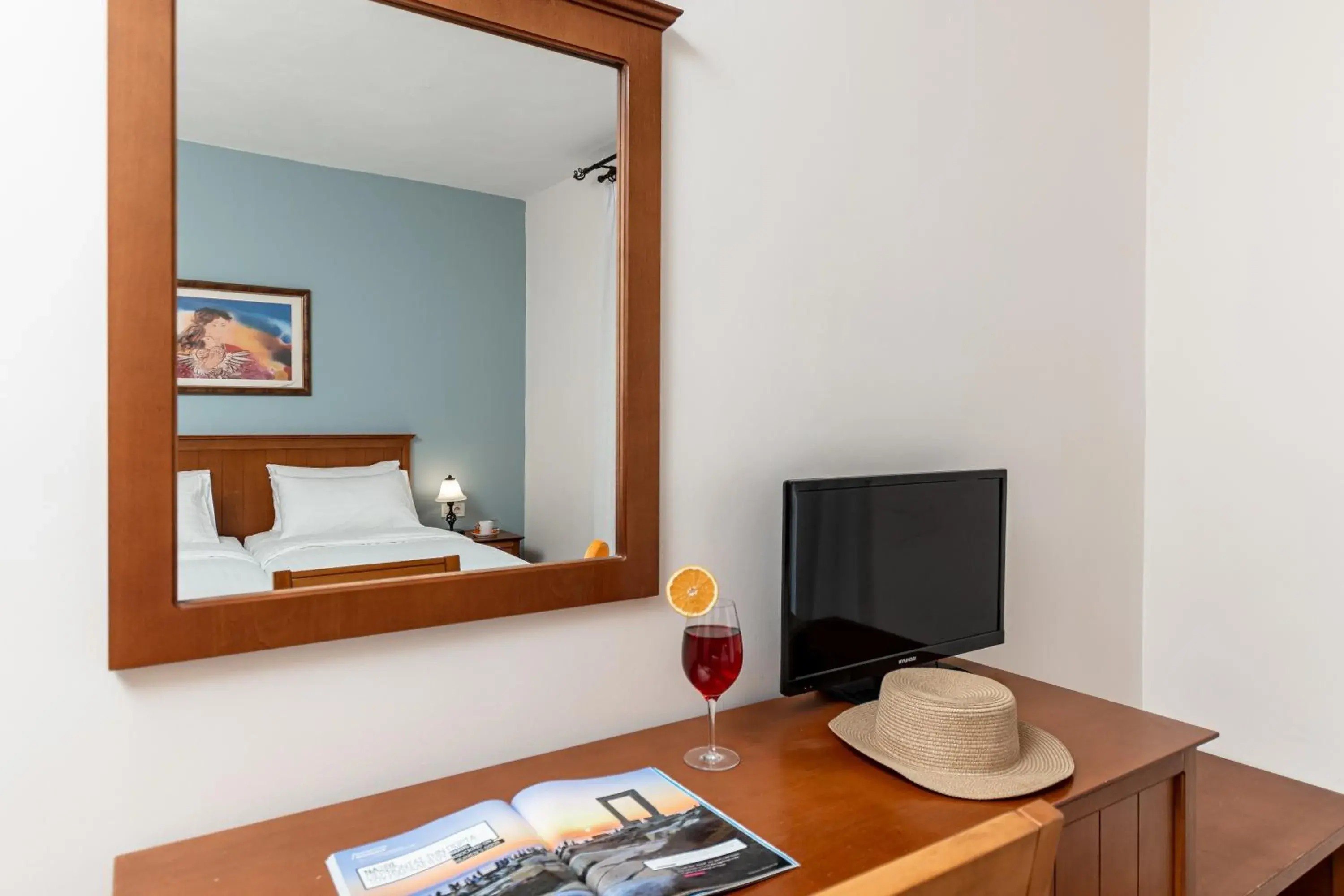 Communal lounge/ TV room, Bed in Naxos Resort Beach Hotel