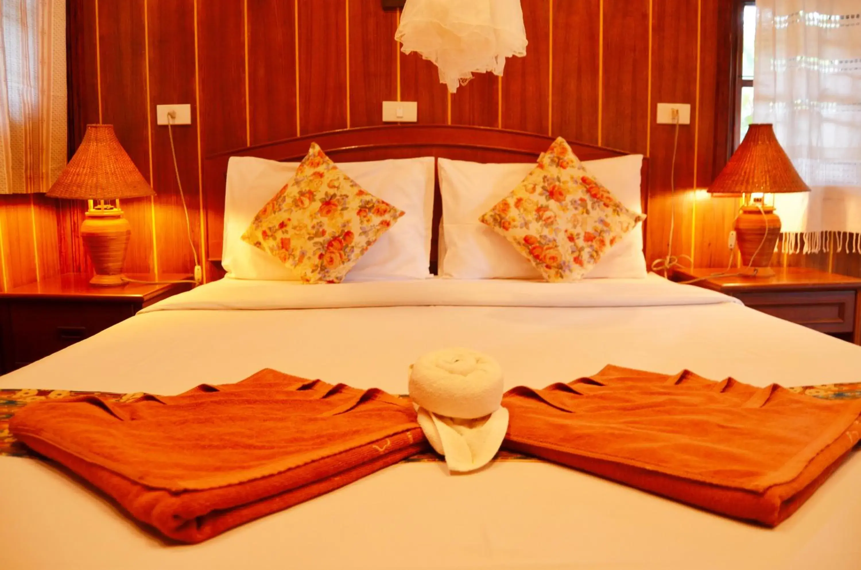 Bed in Sayang Beach Resort Koh Lanta