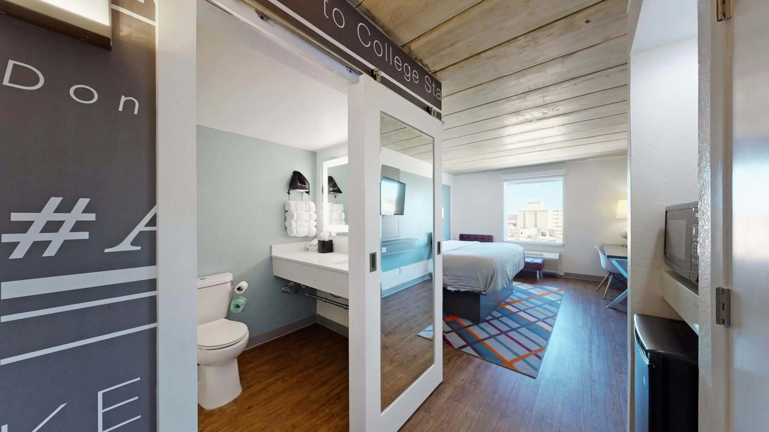 Photo of the whole room, Bed in voco College Station Aggieland by IHG