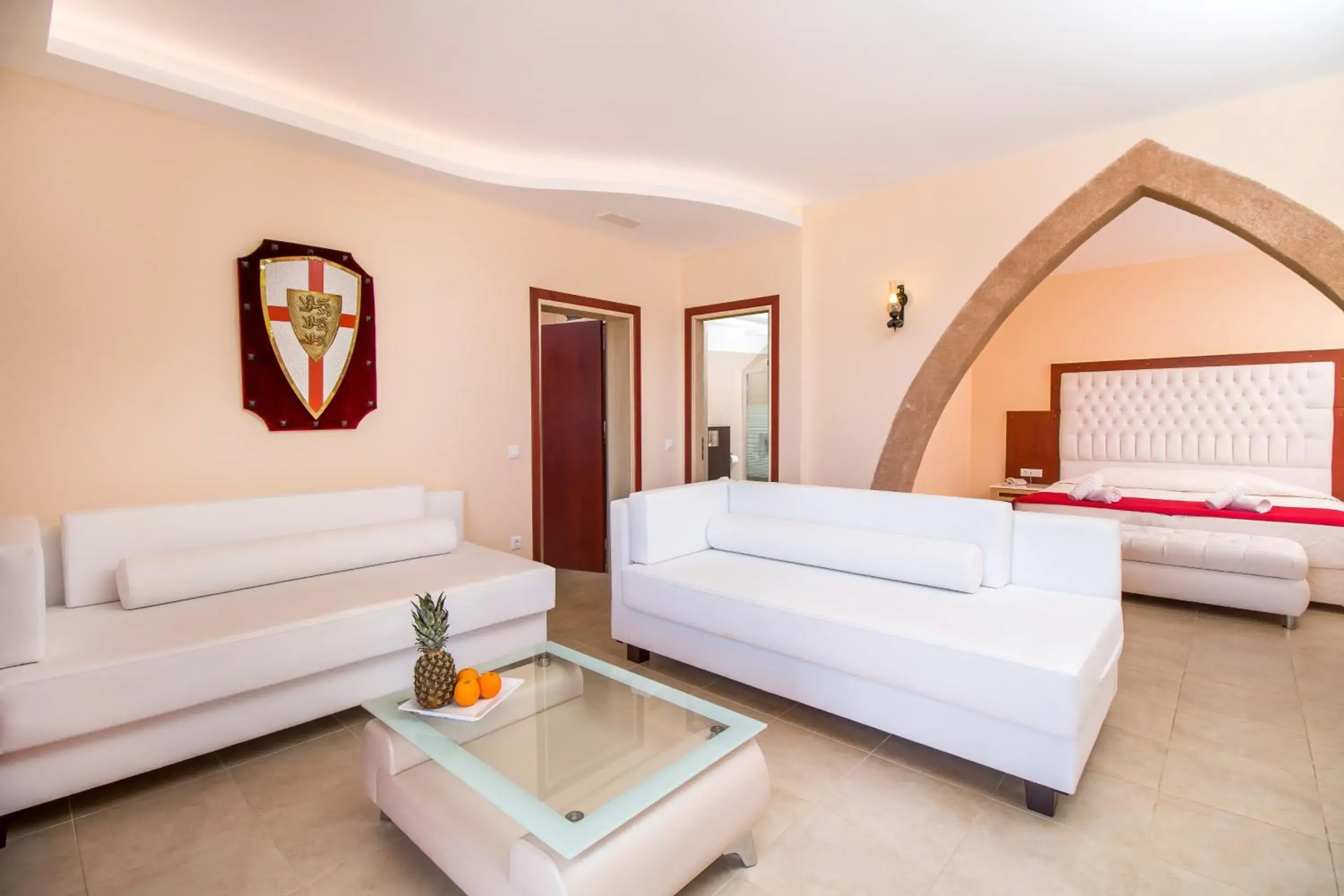 Bed, Seating Area in Castello Di Cavallieri Suites & Spa - Adults Only