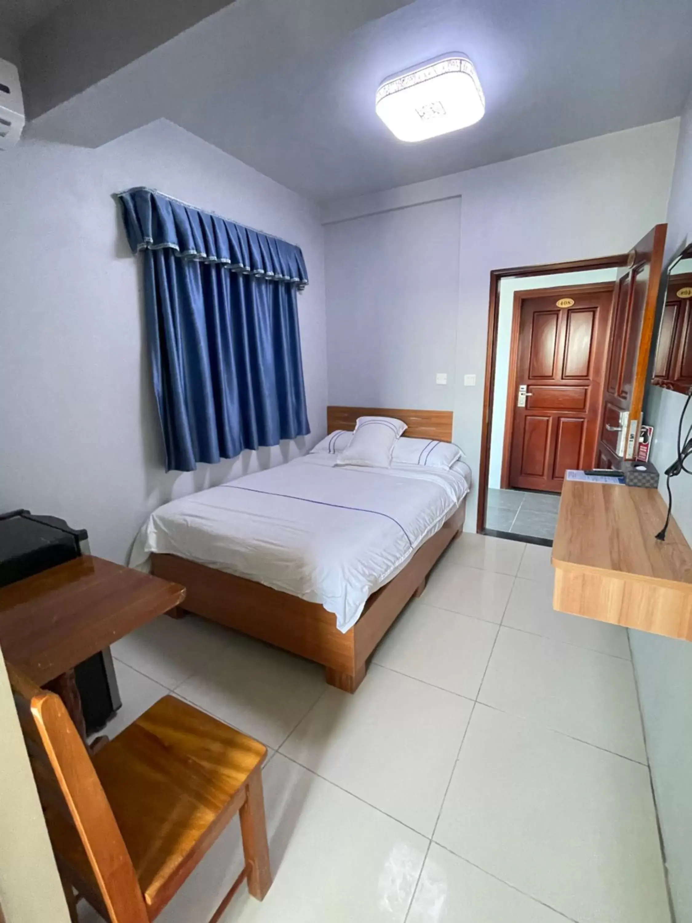 Bed in Caye Caulker Beach Hotel Bed in Caye Caulker Beach Hotel