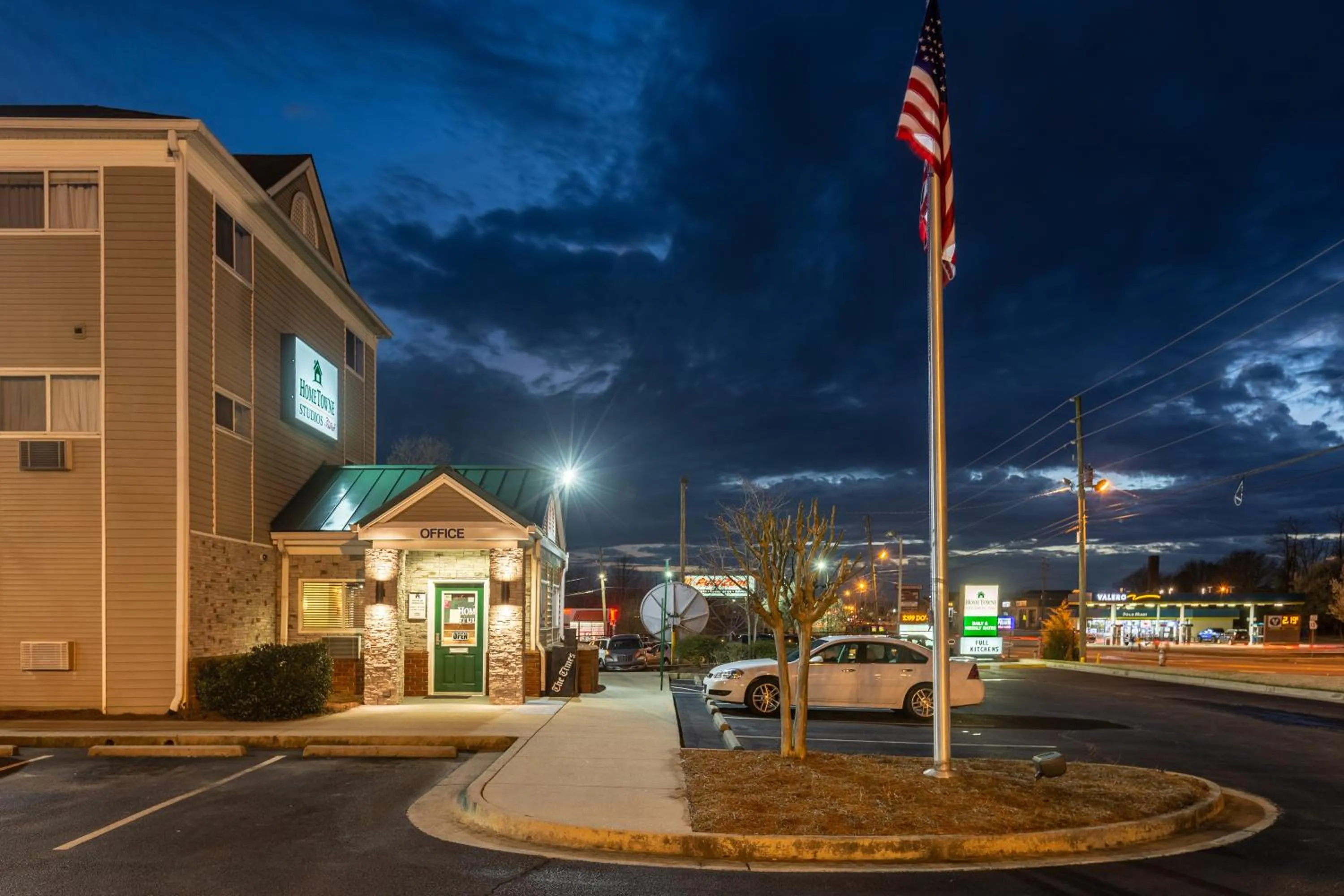 Property building in HomeTowne Studios by Red Roof Gainesville, GA