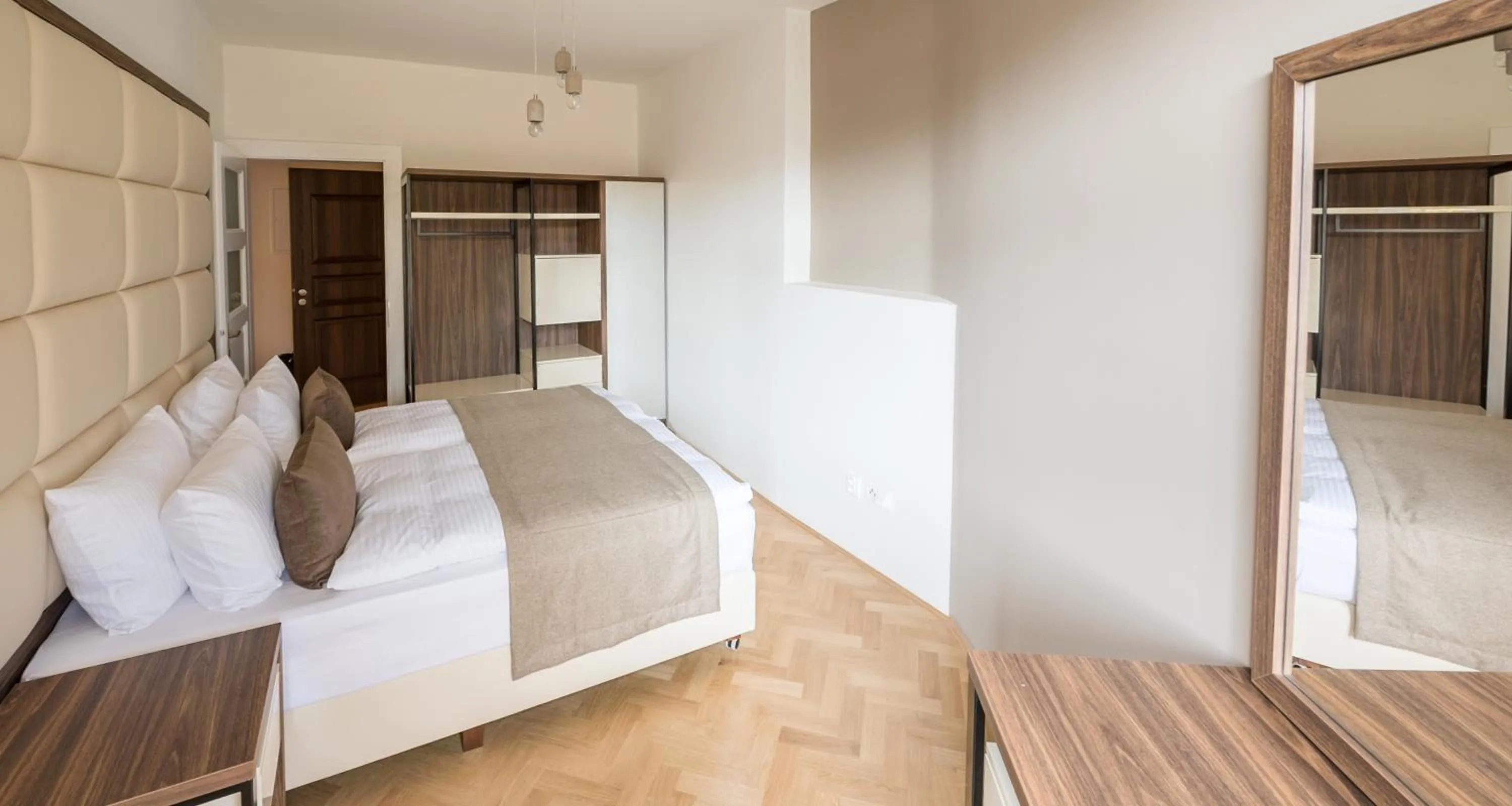 Bed in Letna Garden Suites