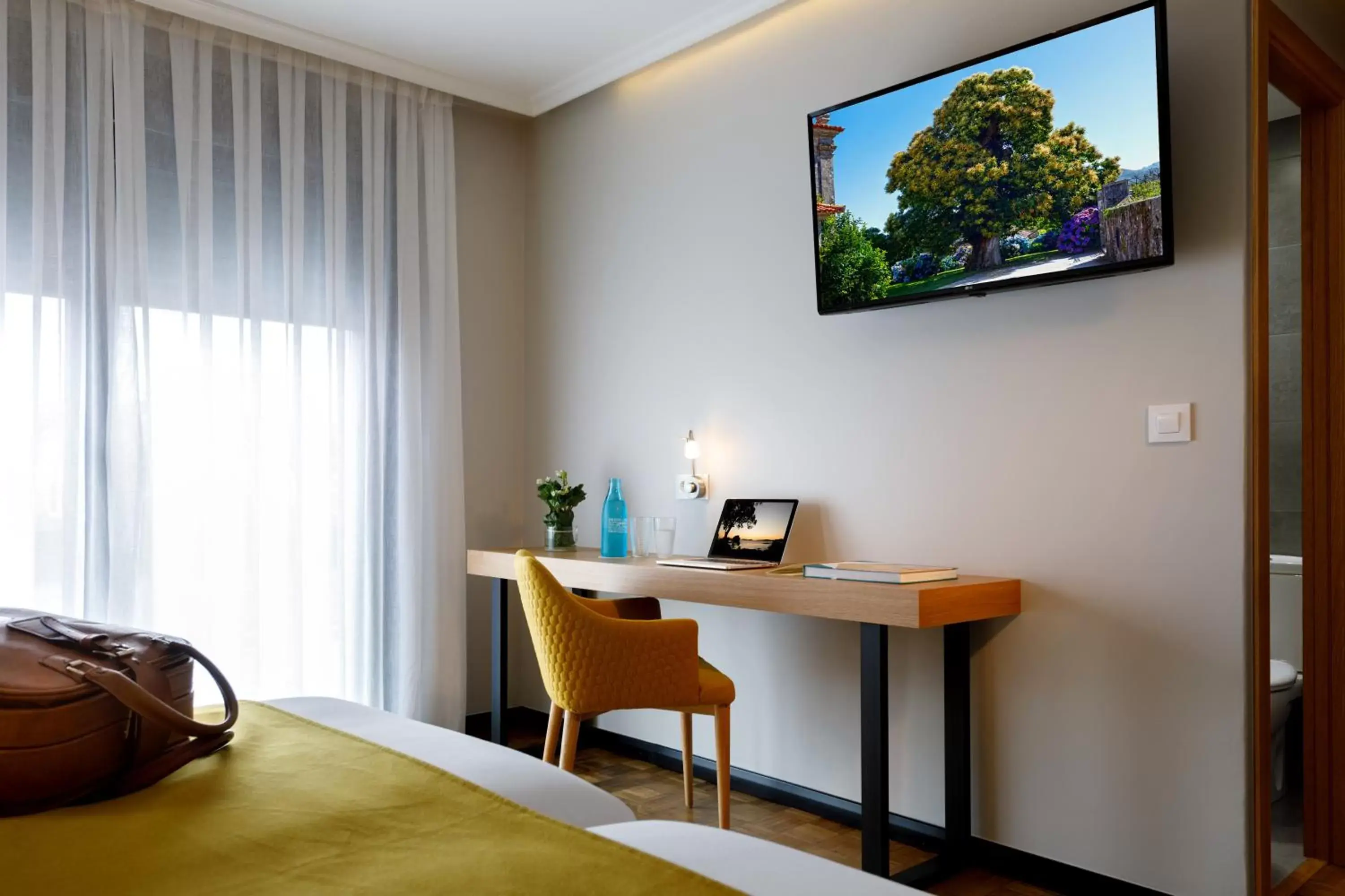 TV and multimedia, TV/Entertainment Center in Hotel Val Convention