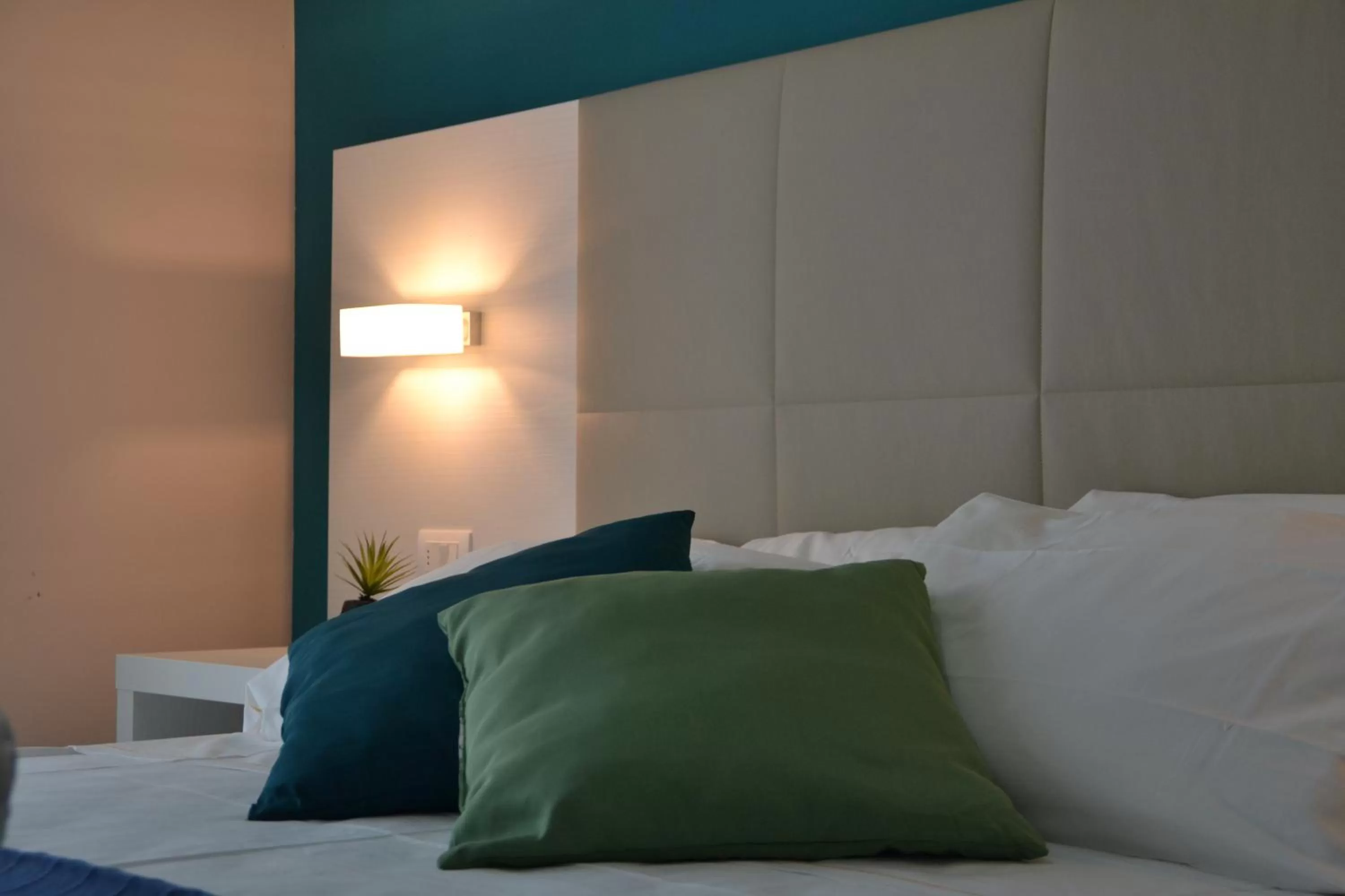 Bed in Elite Boutique Hotel