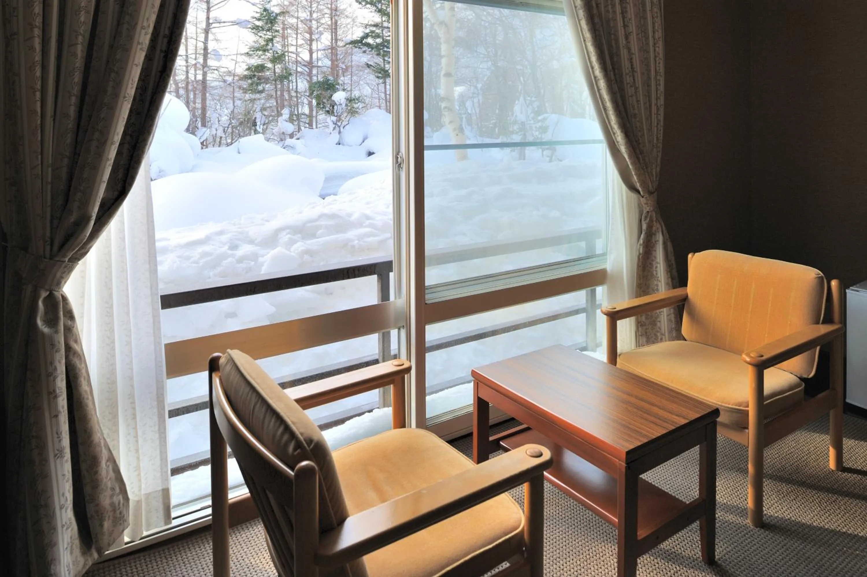 Seating area in Mogamitakayu Zenshichinoyu Ohira