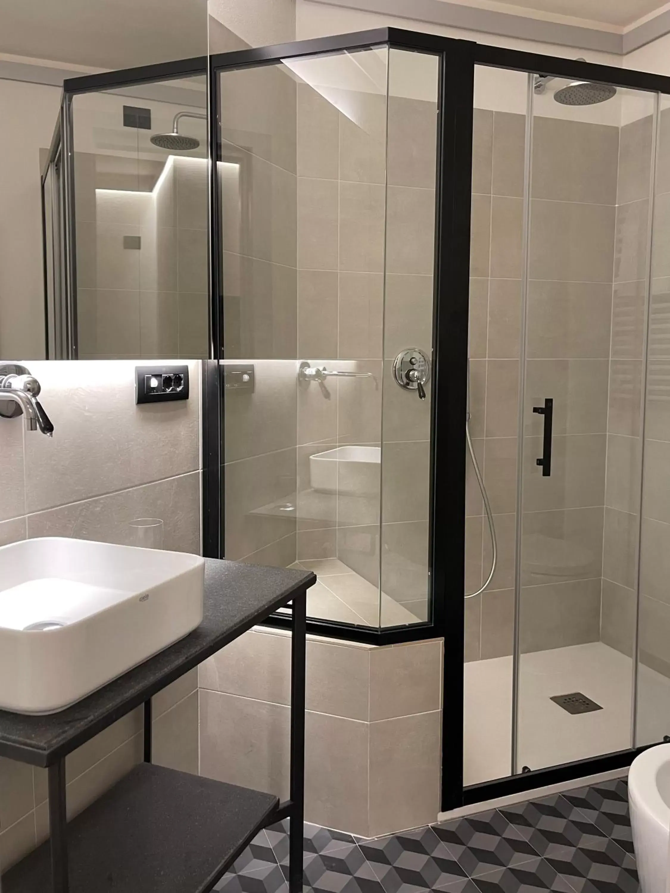 Shower, Bathroom in Raha Suites