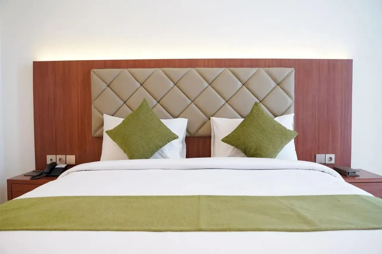 Bed in Luxury Inn Arion Hotel