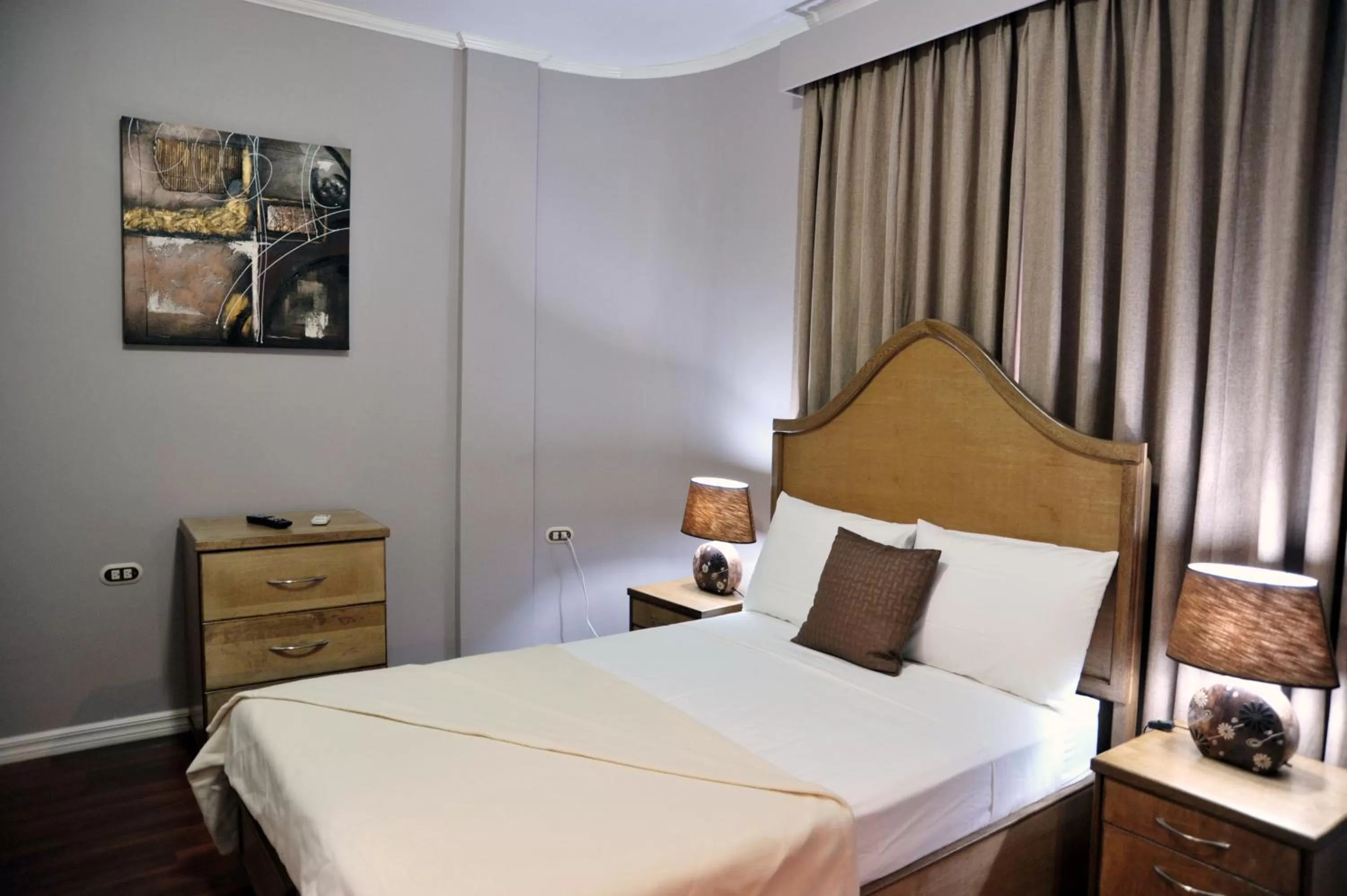 Bed in Culture Crossroads Inn