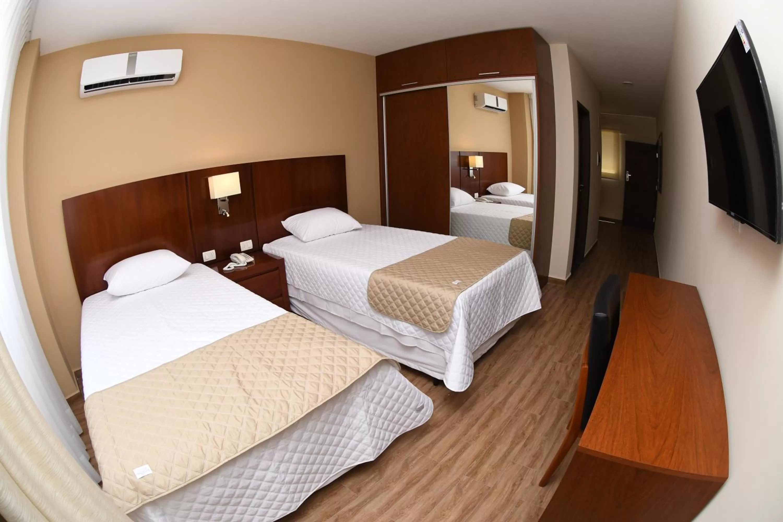 Bed in Taos Apart Hotel