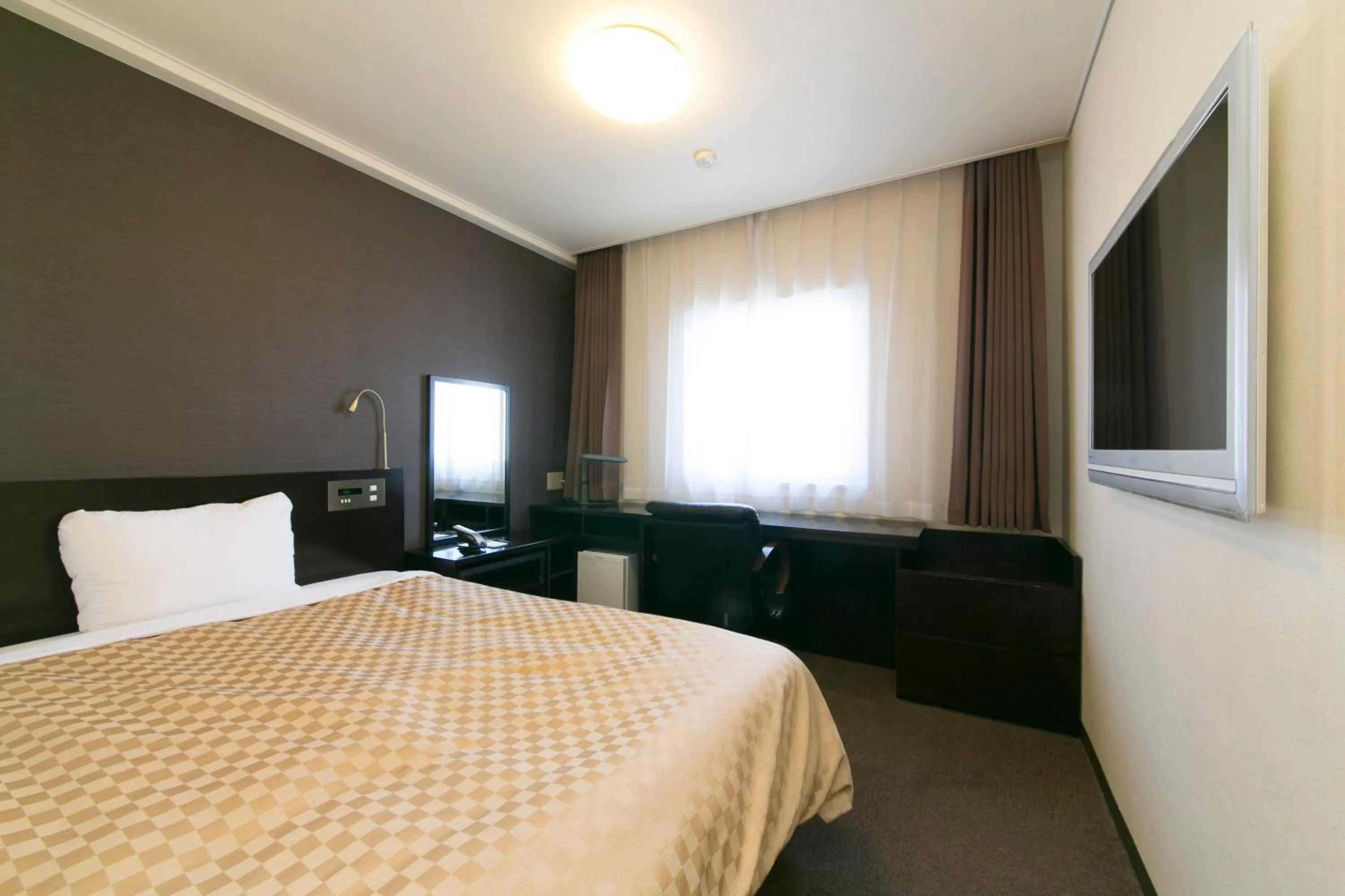 Bed in Hotel nanvan浜名湖