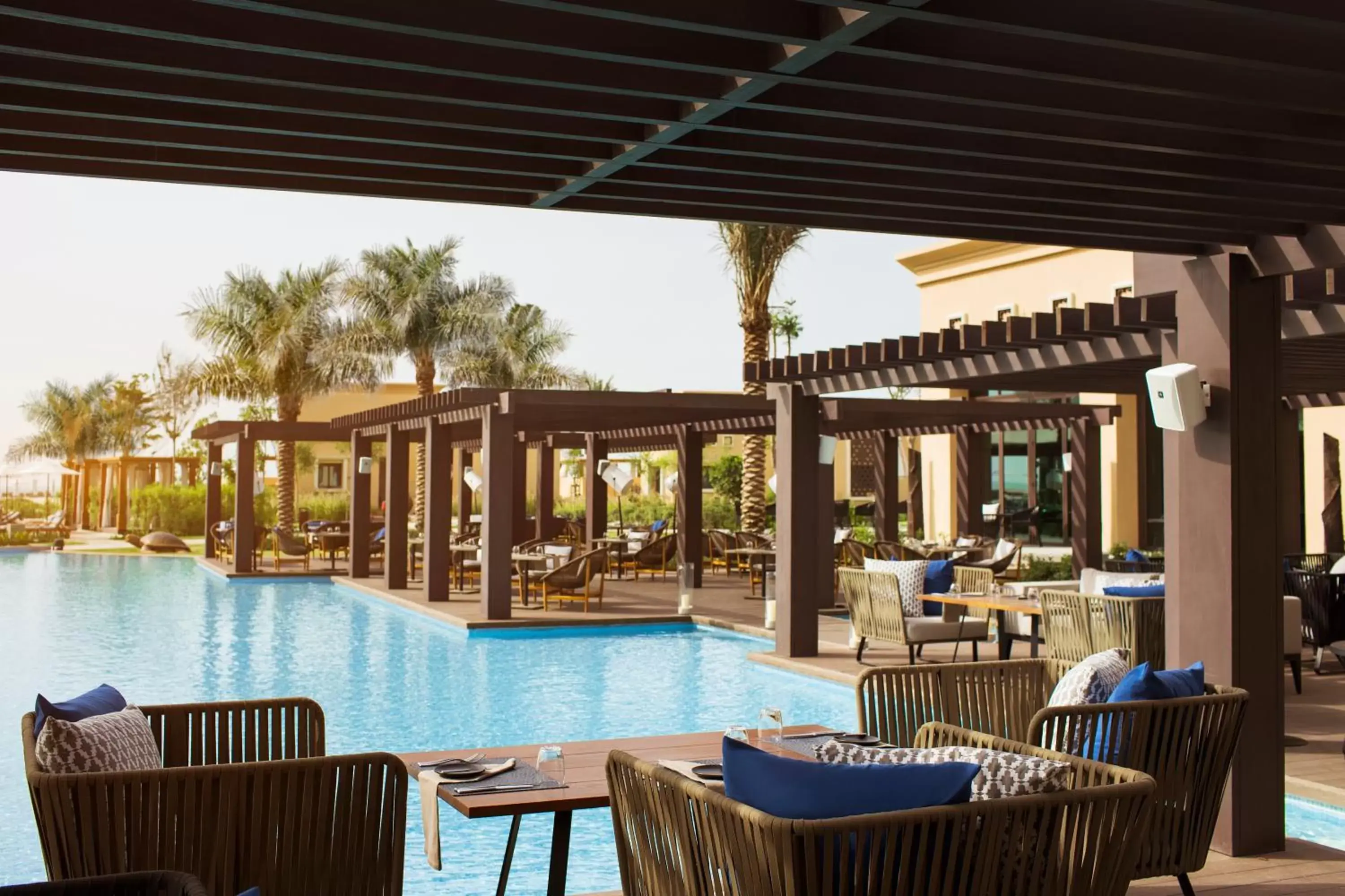 Restaurant/places to eat, Swimming Pool in Saadiyat Rotana Resort and Villas