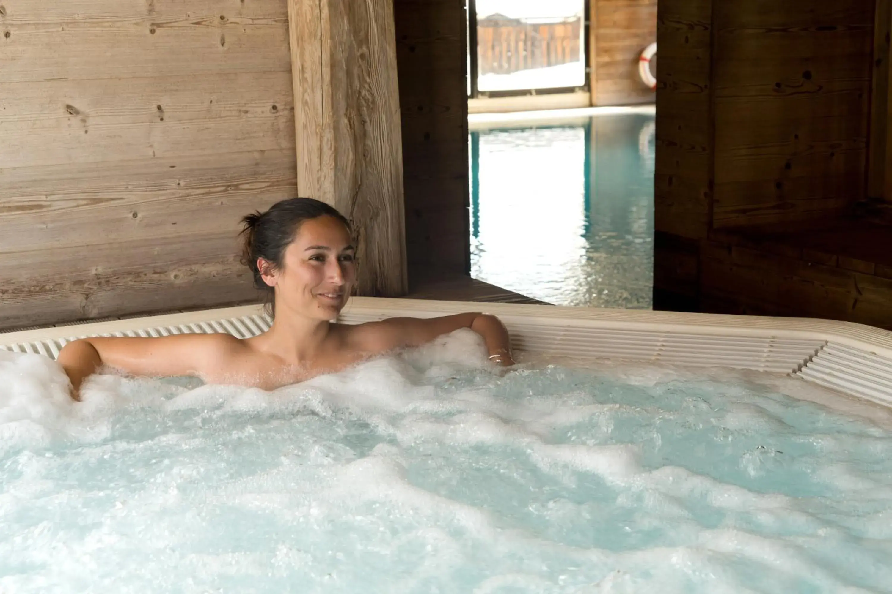 Hot Tub, Guests in Chalet-Hotel La Marmotte, La Tapiaz & SPA, The Originals Relais (Hotel-Chalet de Tradition)