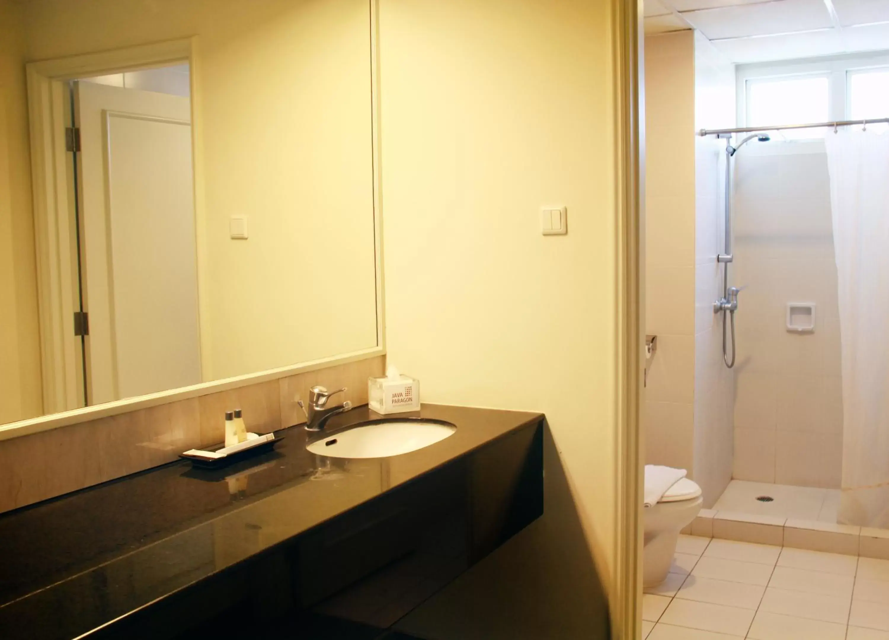 Bathroom in Java Paragon Hotel & Residences