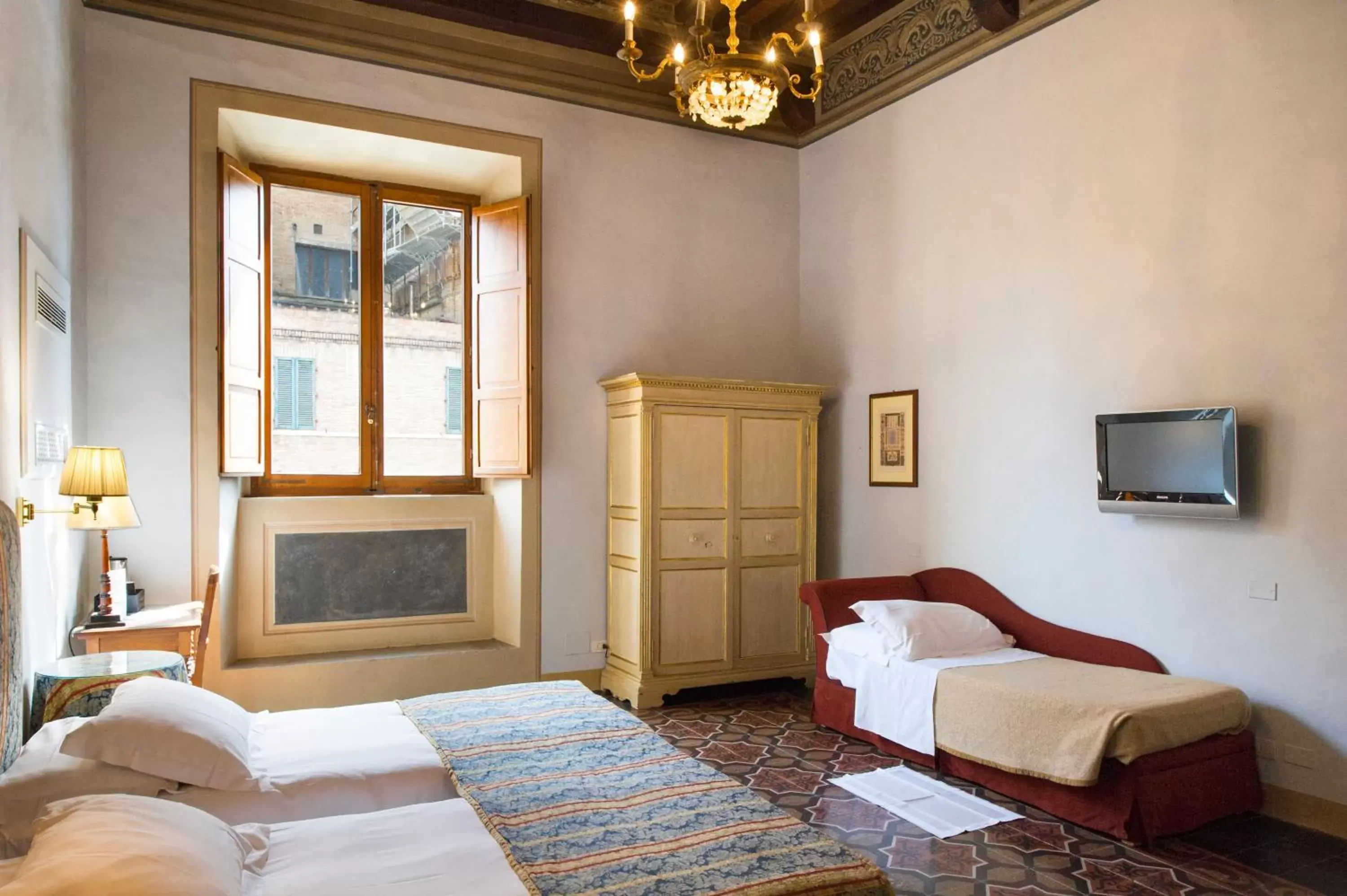 Photo of the whole room, Bed in Palazzo Ravizza