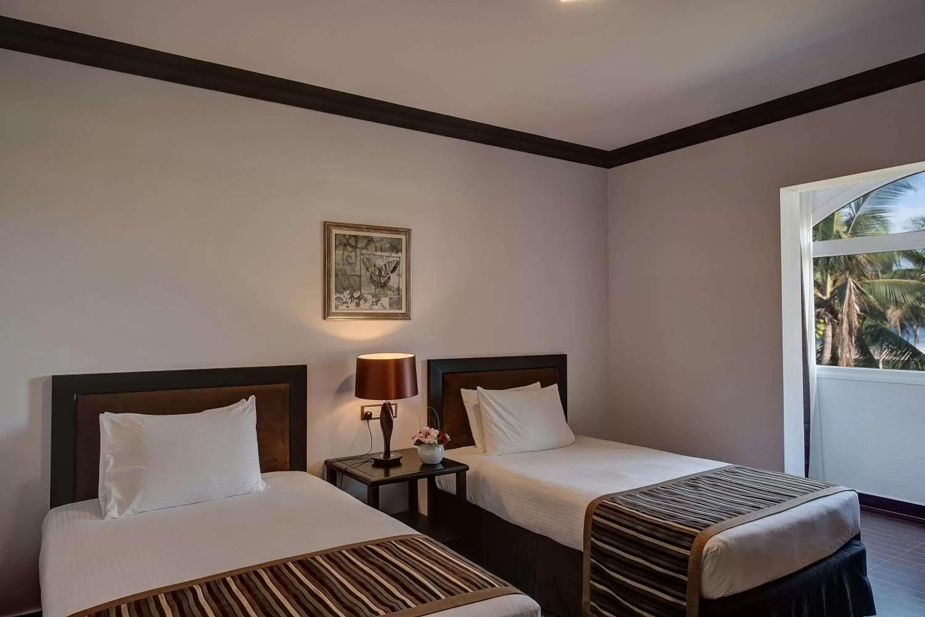 Bedroom, Bed in Crowne Plaza Resort Salalah, an IHG Hotel