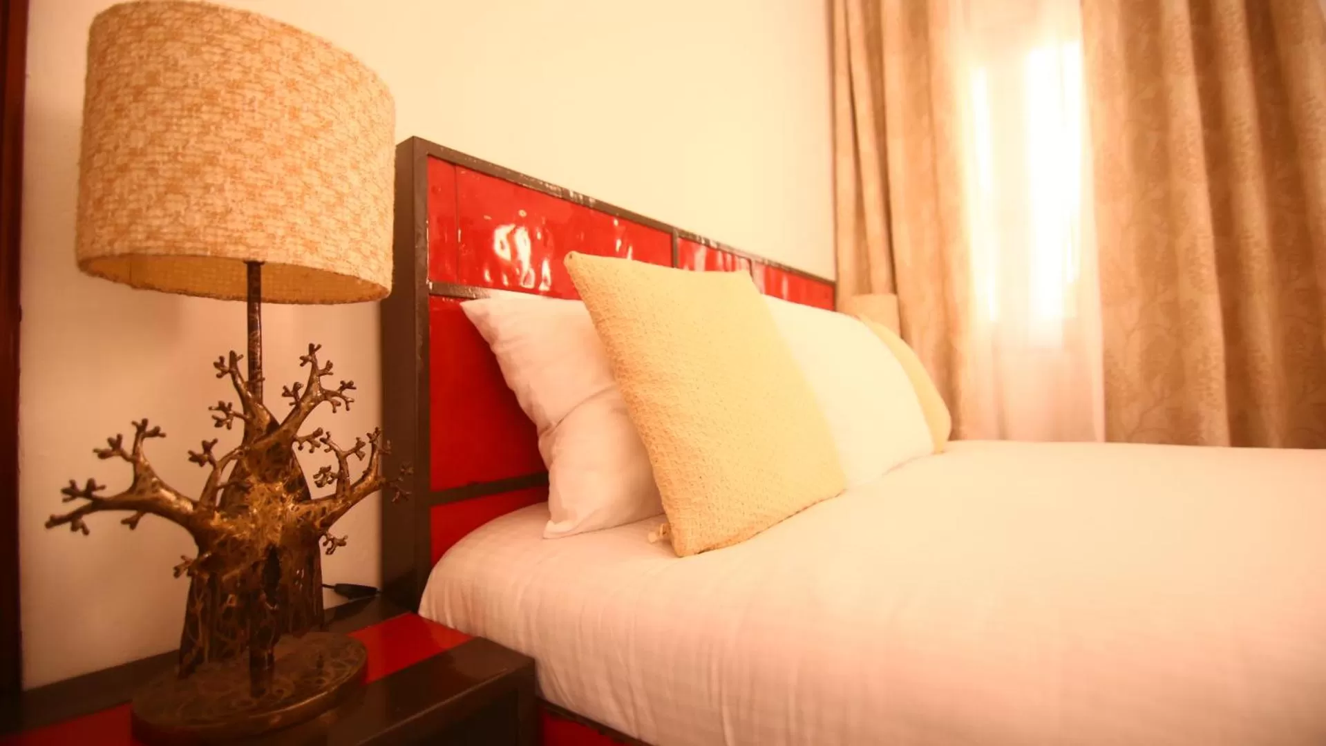 Bed in ILLIYIN Boutique Hotel