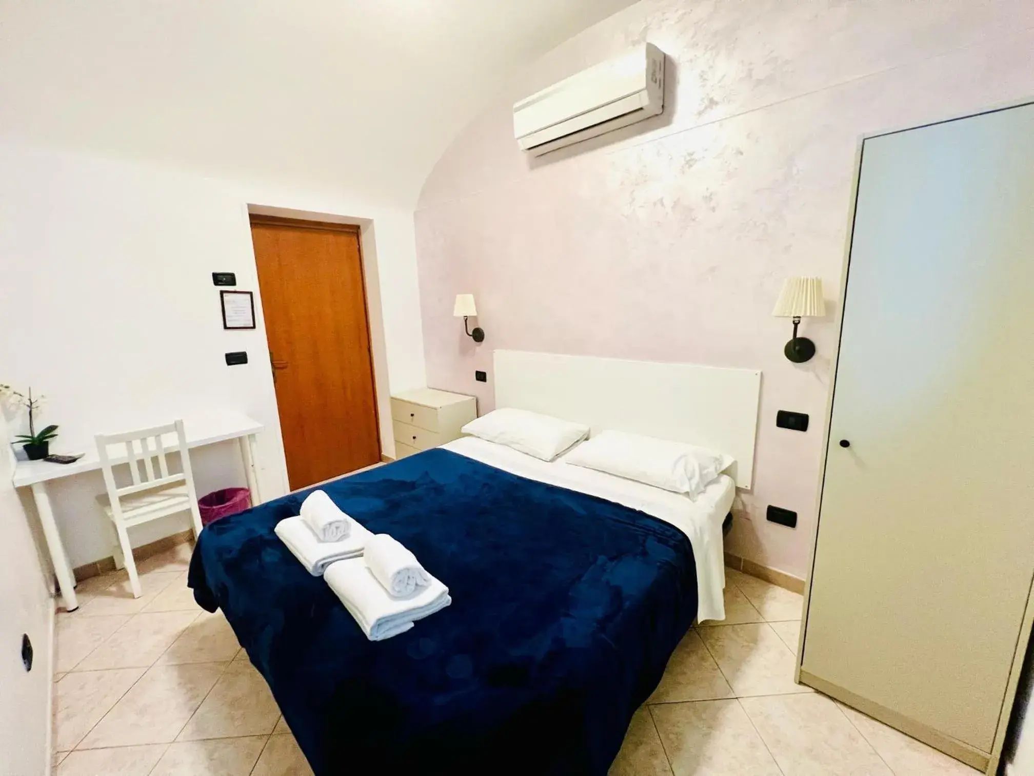 Bed in Hotel Pisa