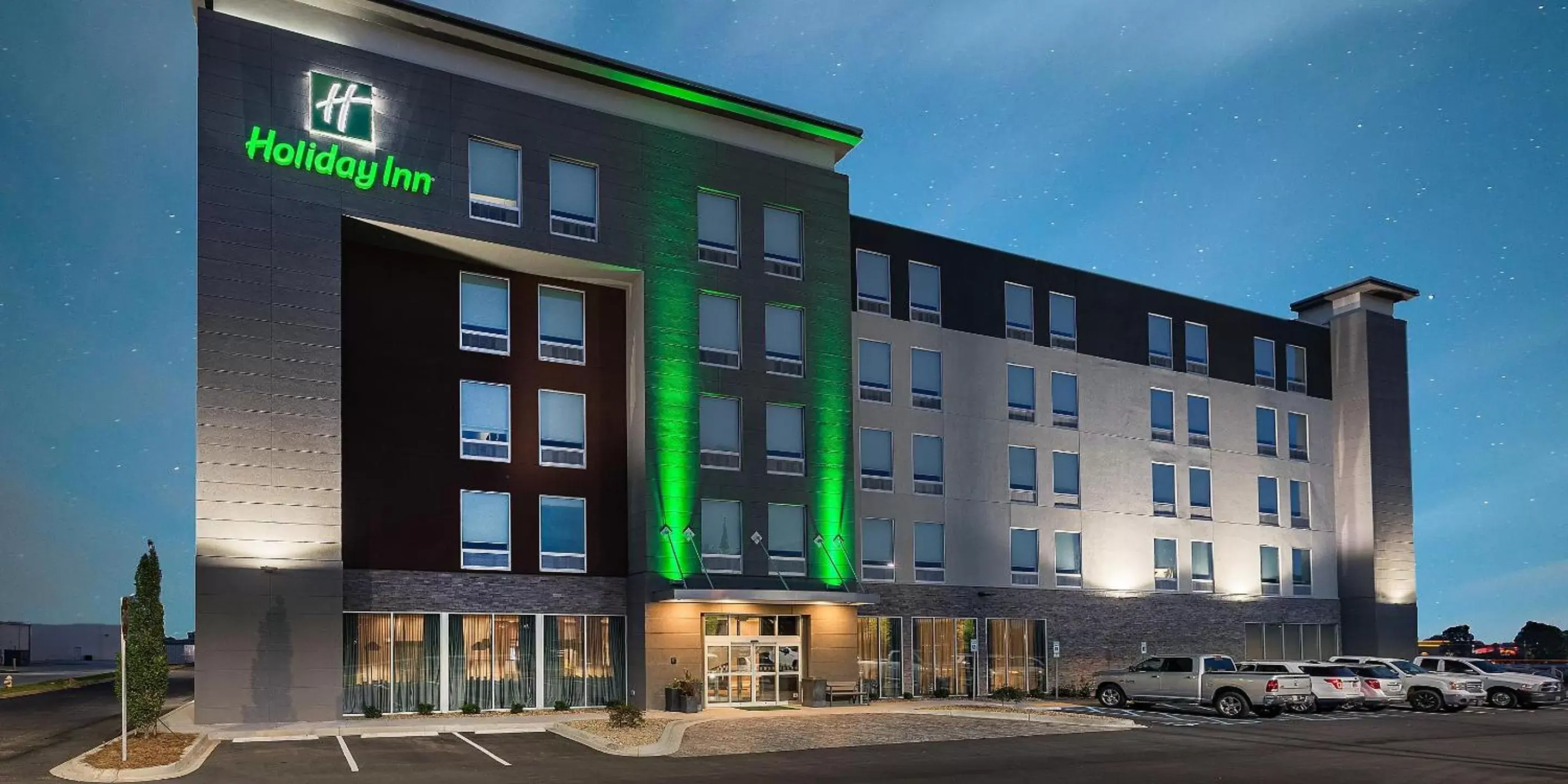 Swimming pool, Property Building in Holiday Inn Greenville - Woodruff Road, an IHG Hotel