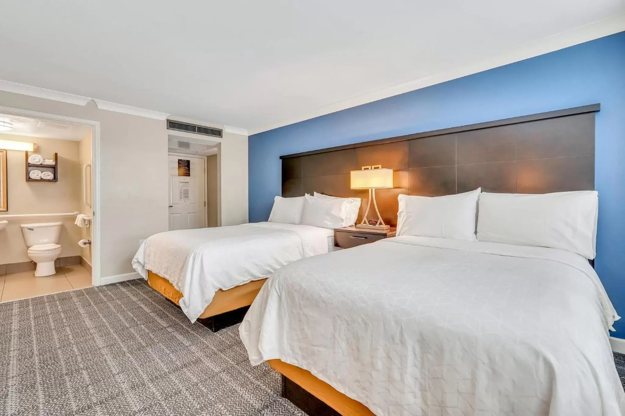 Bathroom, Bed in Staybridge Suites Savannah Historic District, an IHG Hotel