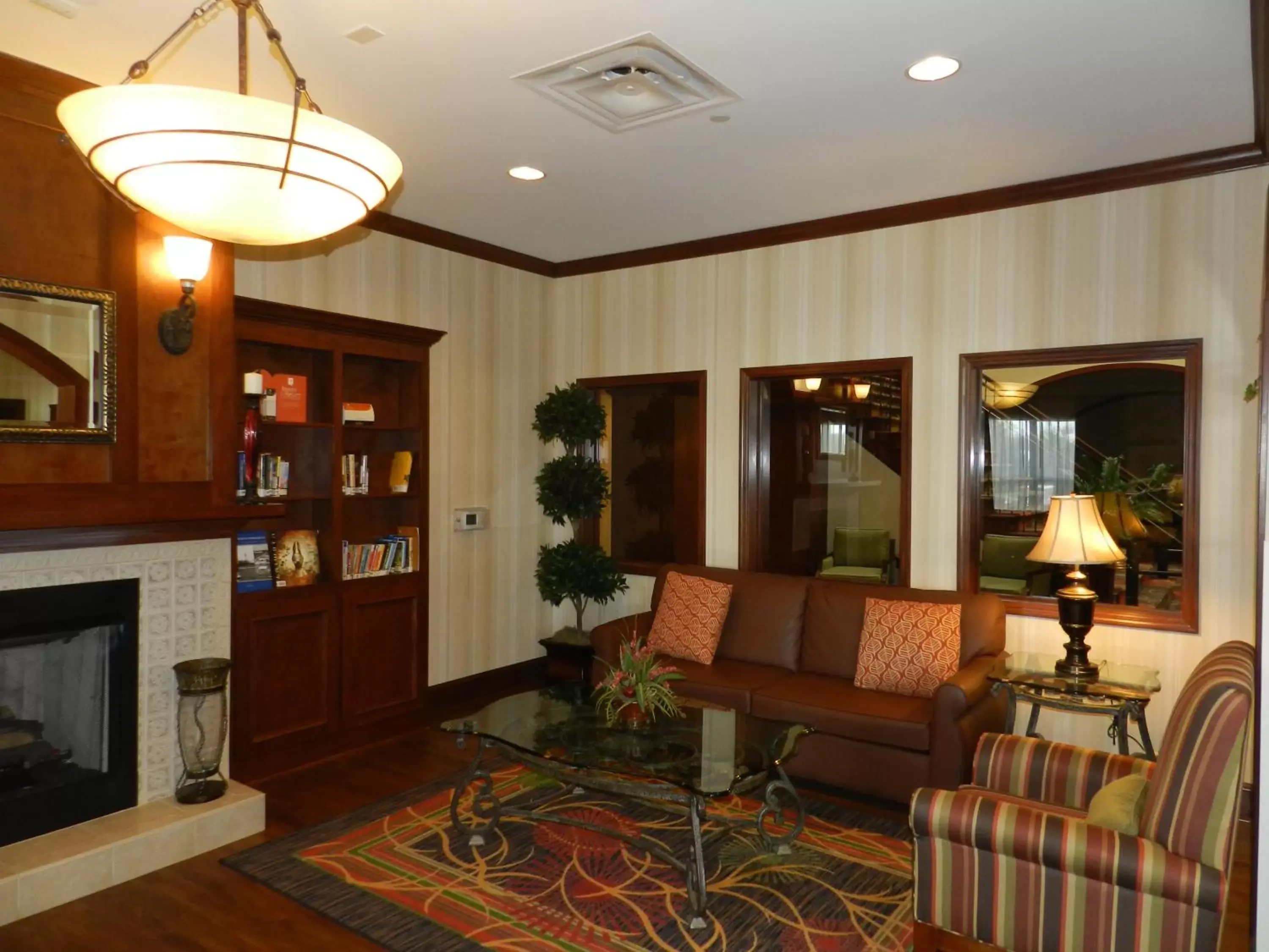 Library, Lobby/Reception in Country Inn & Suites by Radisson, Braselton, GA