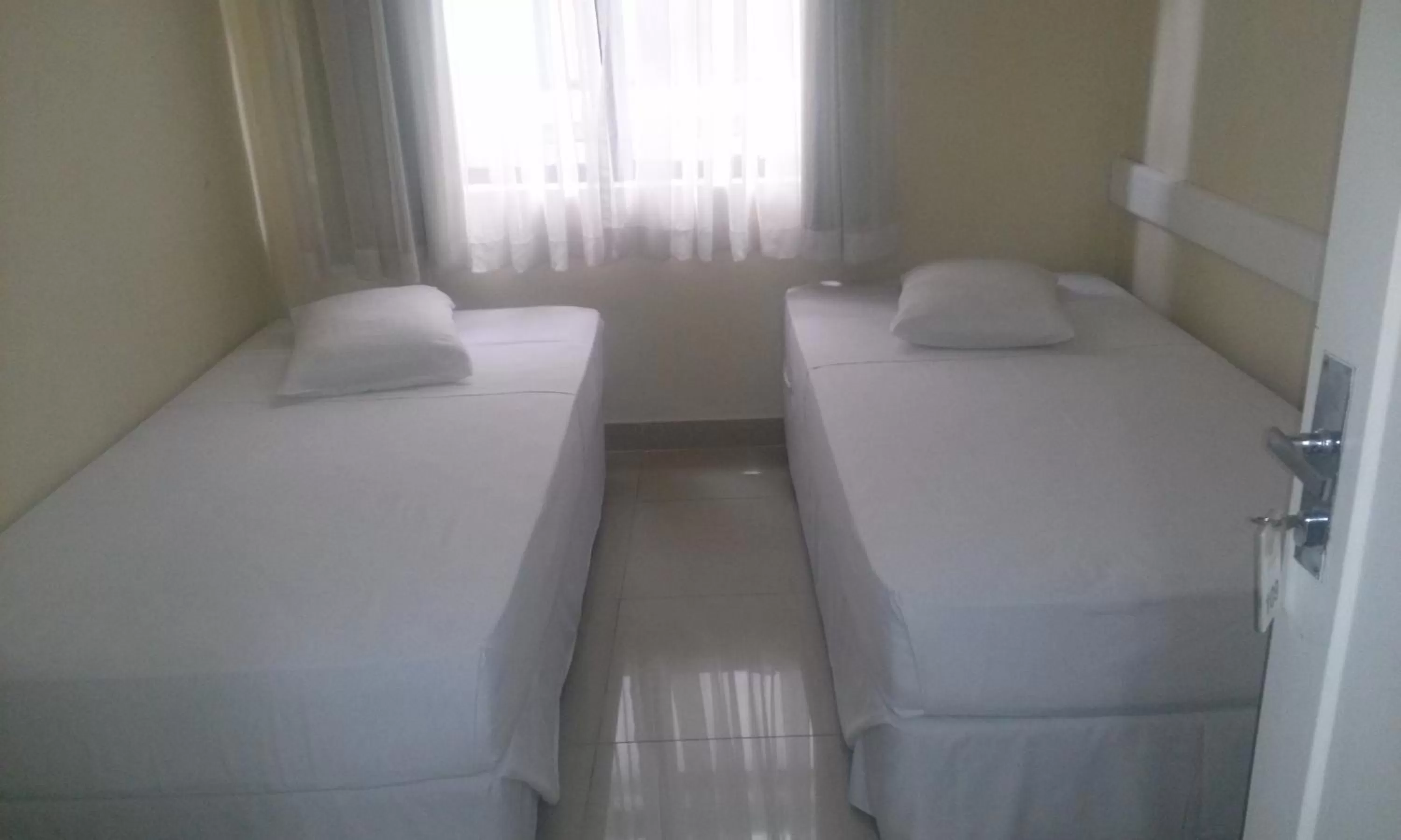 Bed in Hotel Estação Express