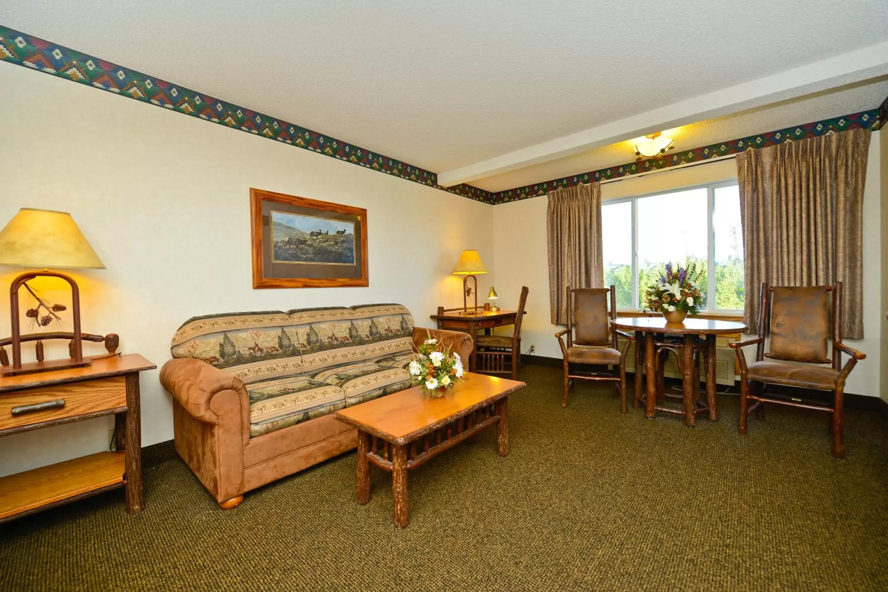 Bed, Seating Area in Kelly Inn West Yellowstone