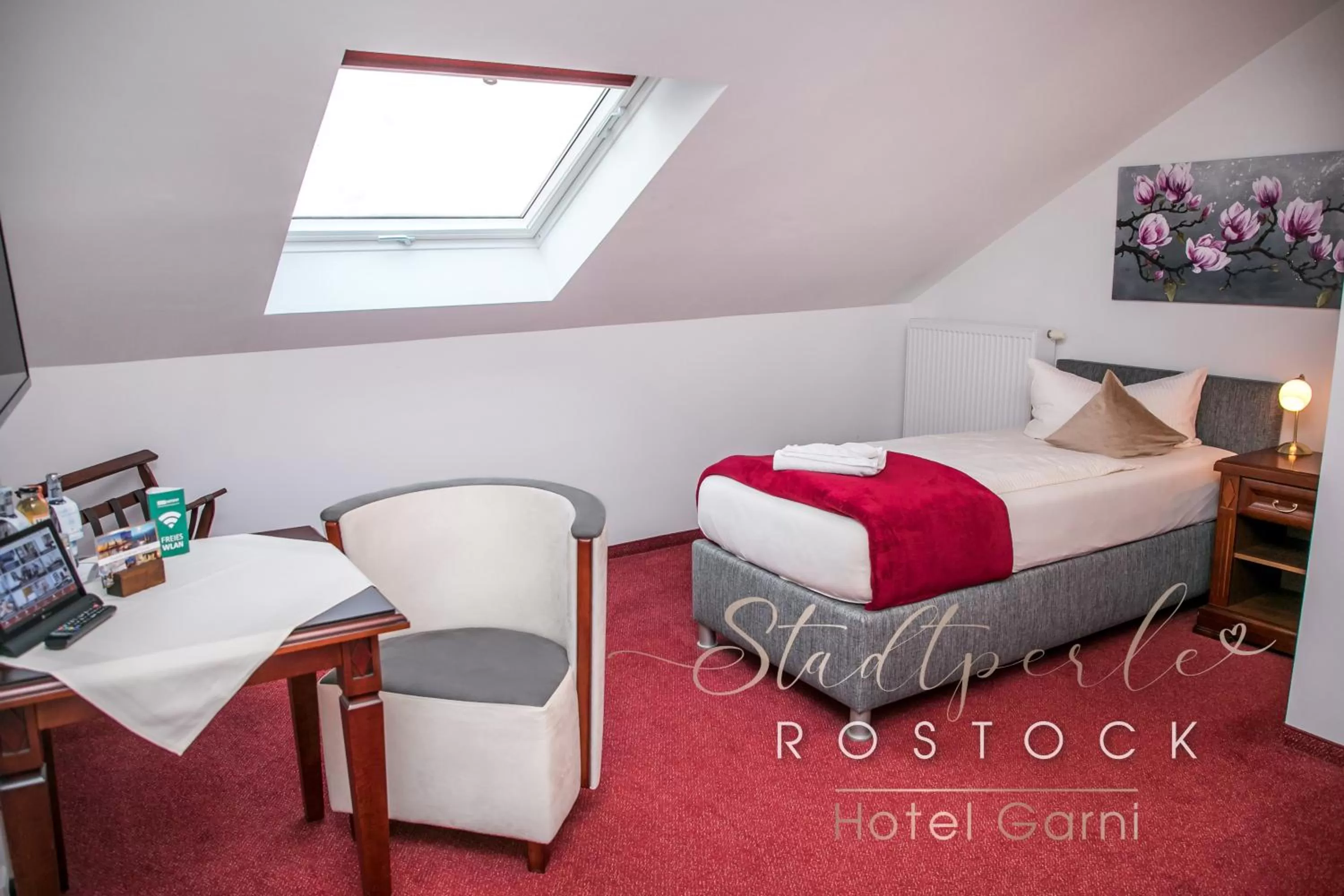 Living room, Bed in Stadtperle Rostock