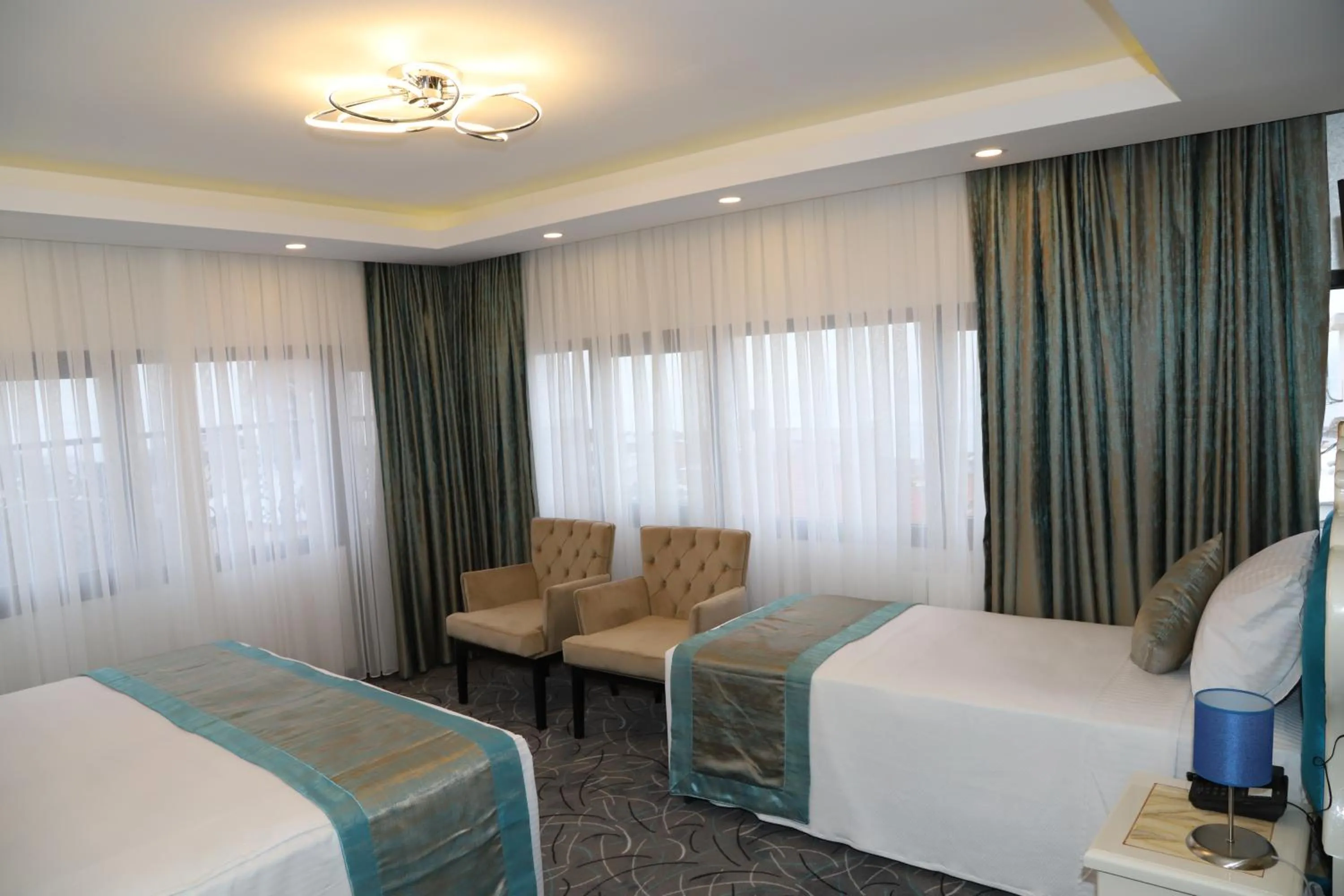 Bed in Grand Kavi Hotel