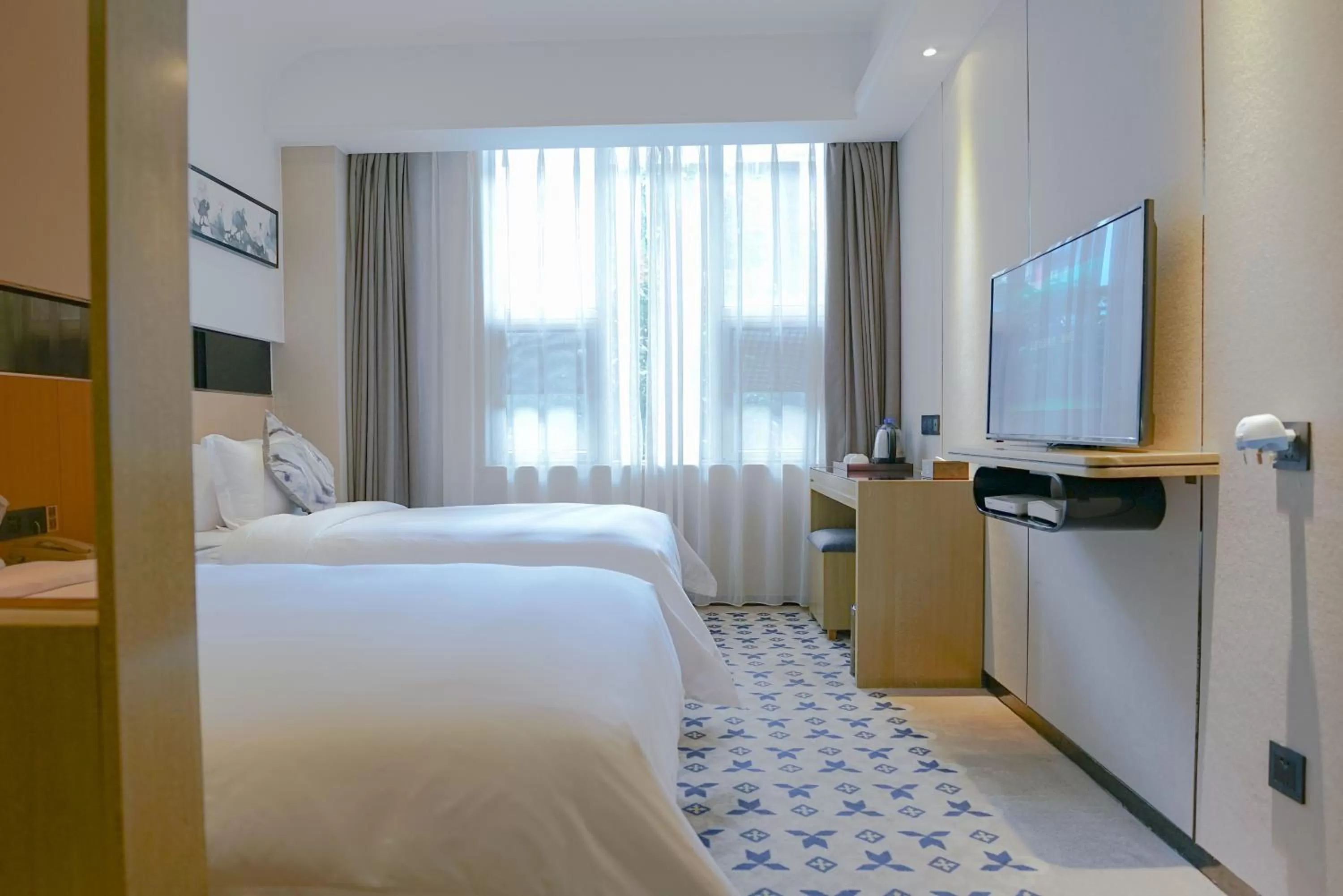Bed in Paco Hotel Tiyuxilu Metro Guangzhou-Free Shuttle Bus fir Canton Fair