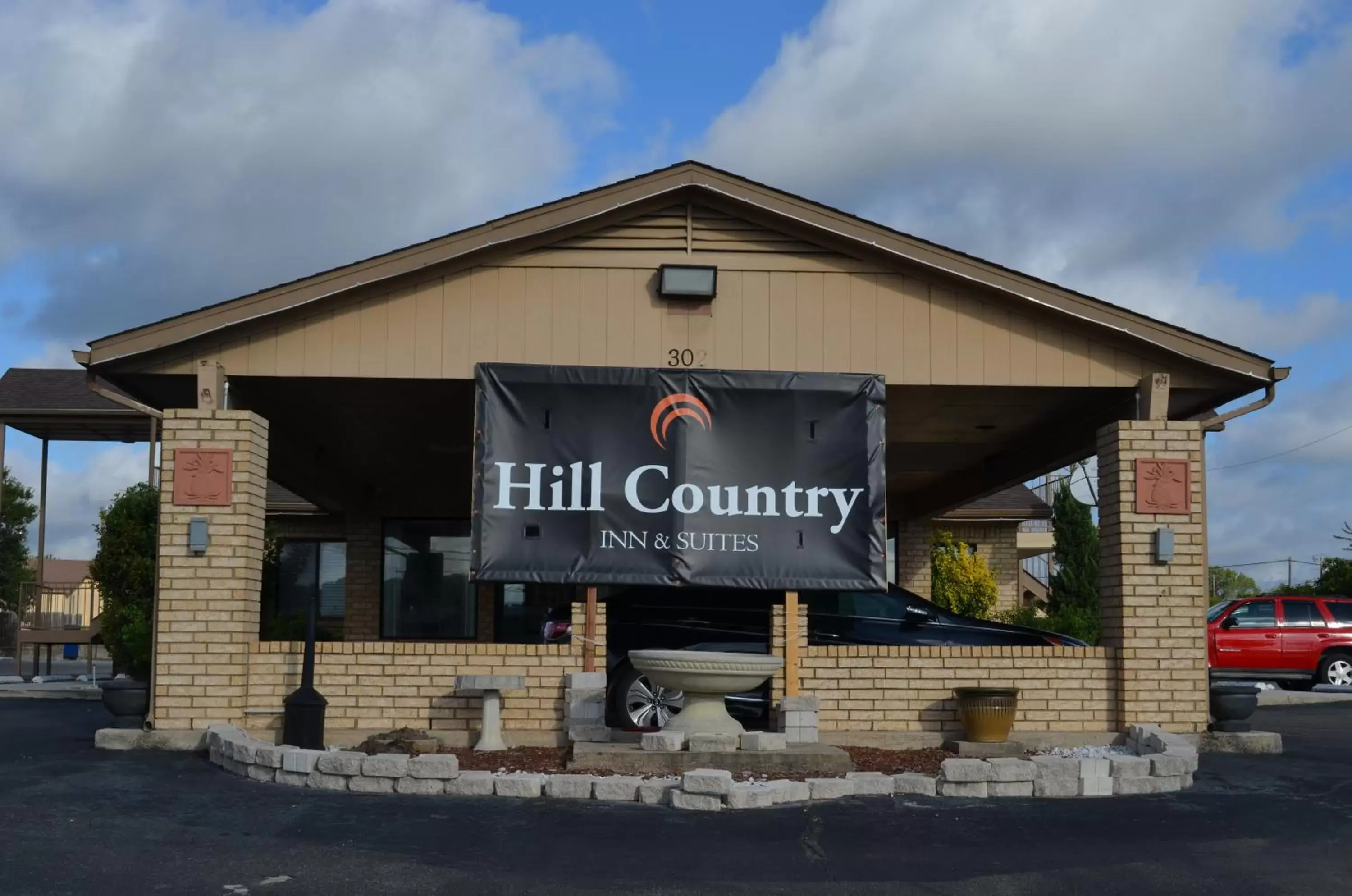 Property building in Hill Country Inn and Suite