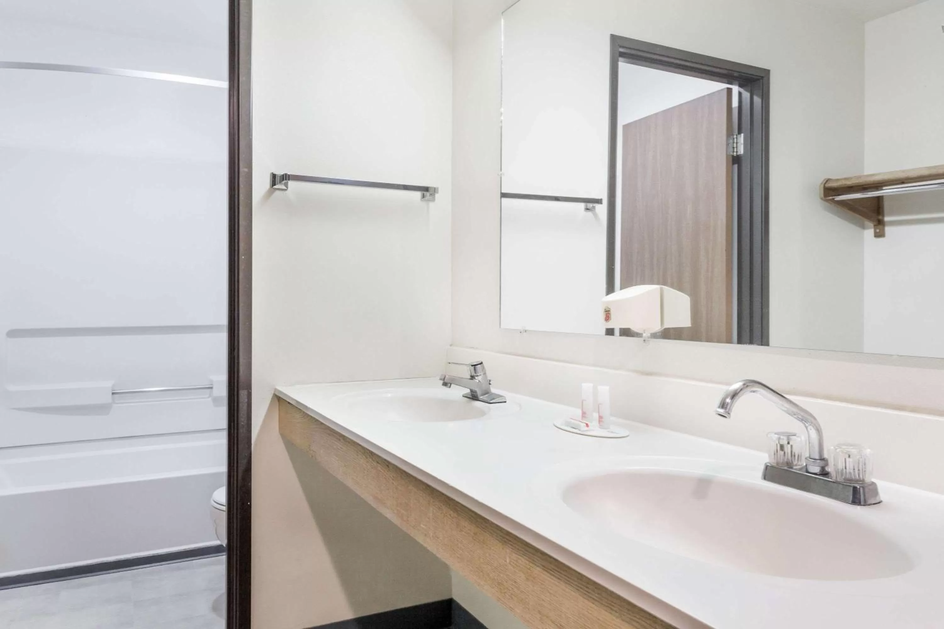 Bathroom in Super 8 by Wyndham Logan