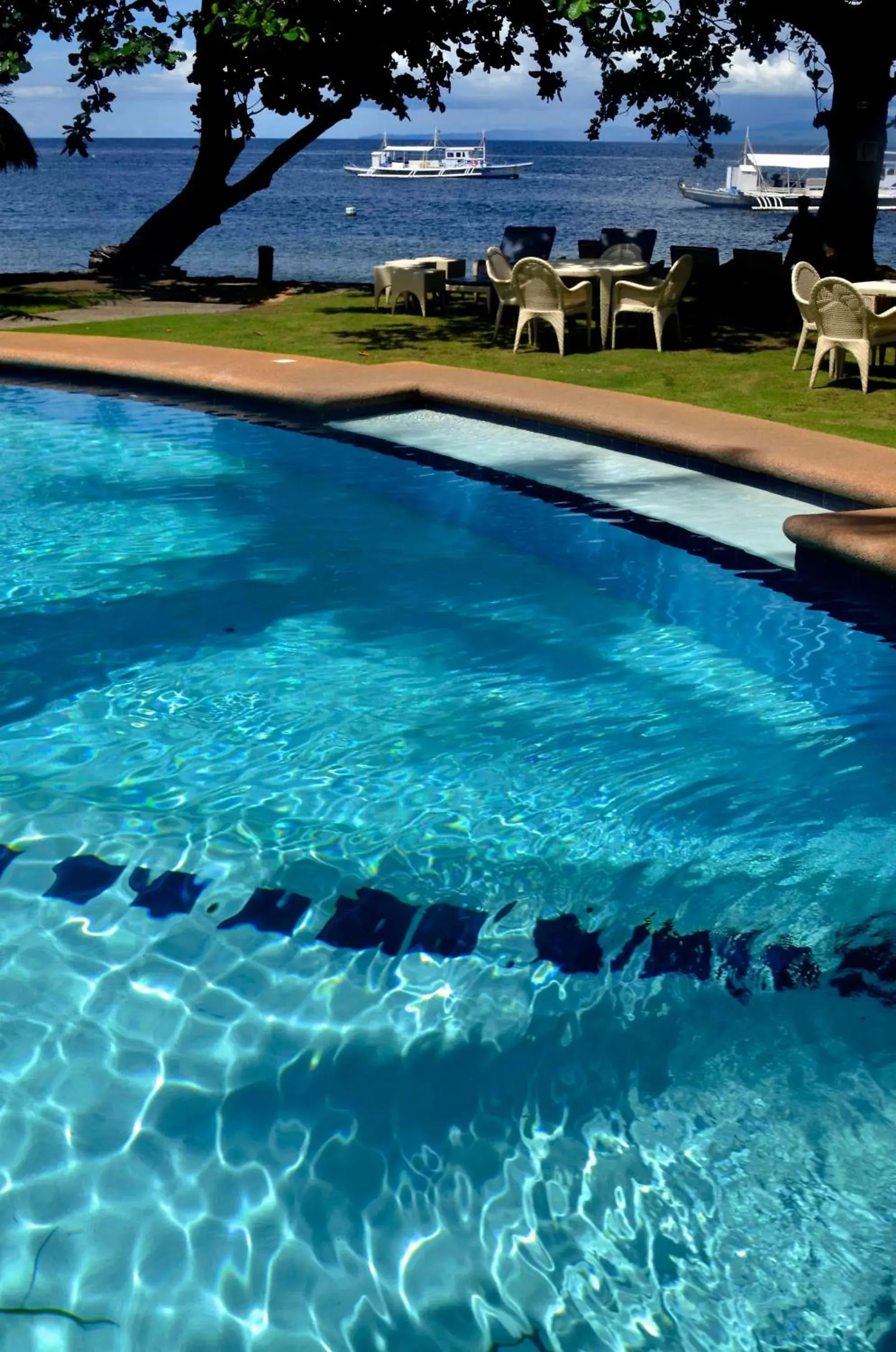 Sea view, Swimming Pool in Mike's Dauin Dive Resort