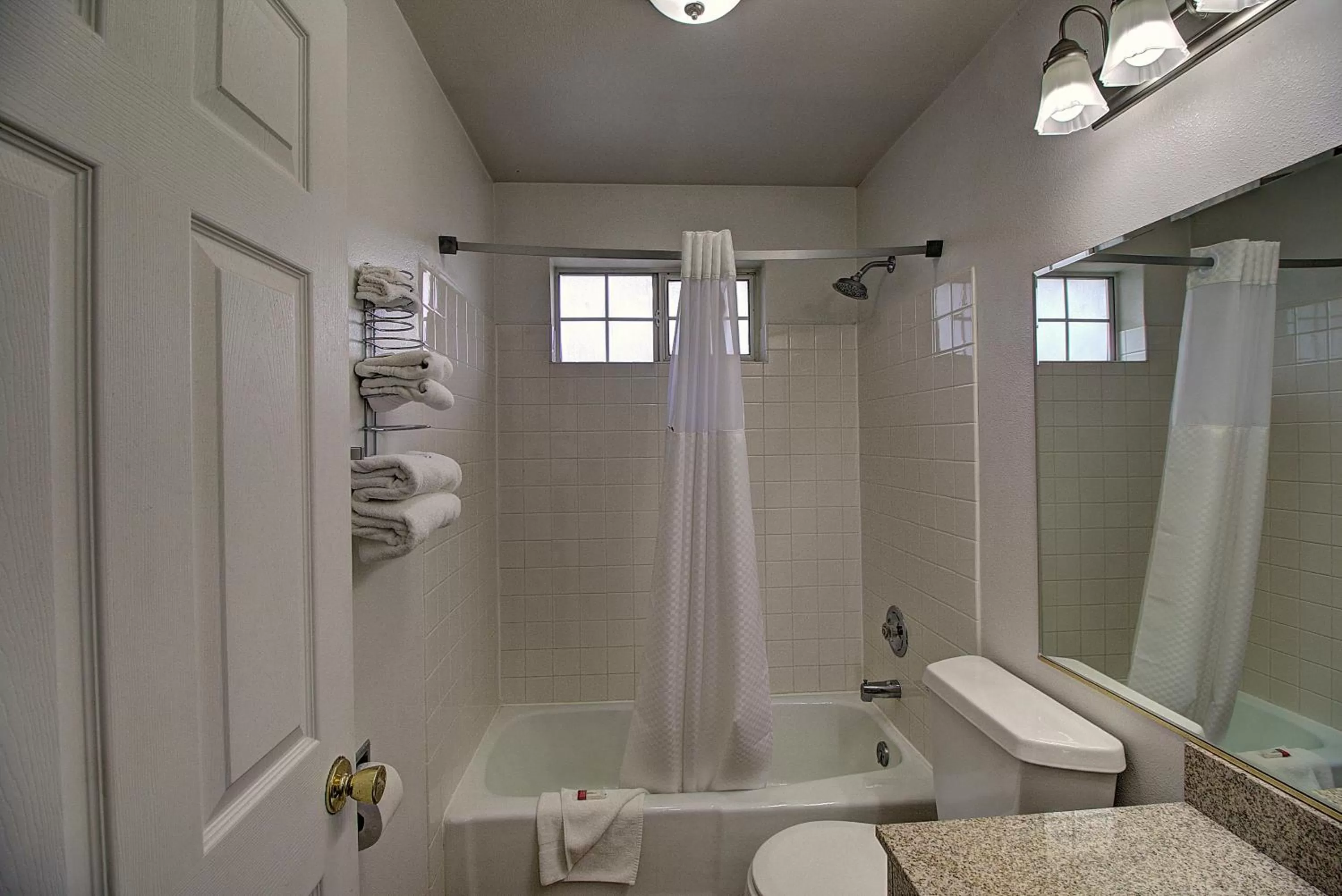 Bathroom in Days Inn & Suites by Wyndham Lolo