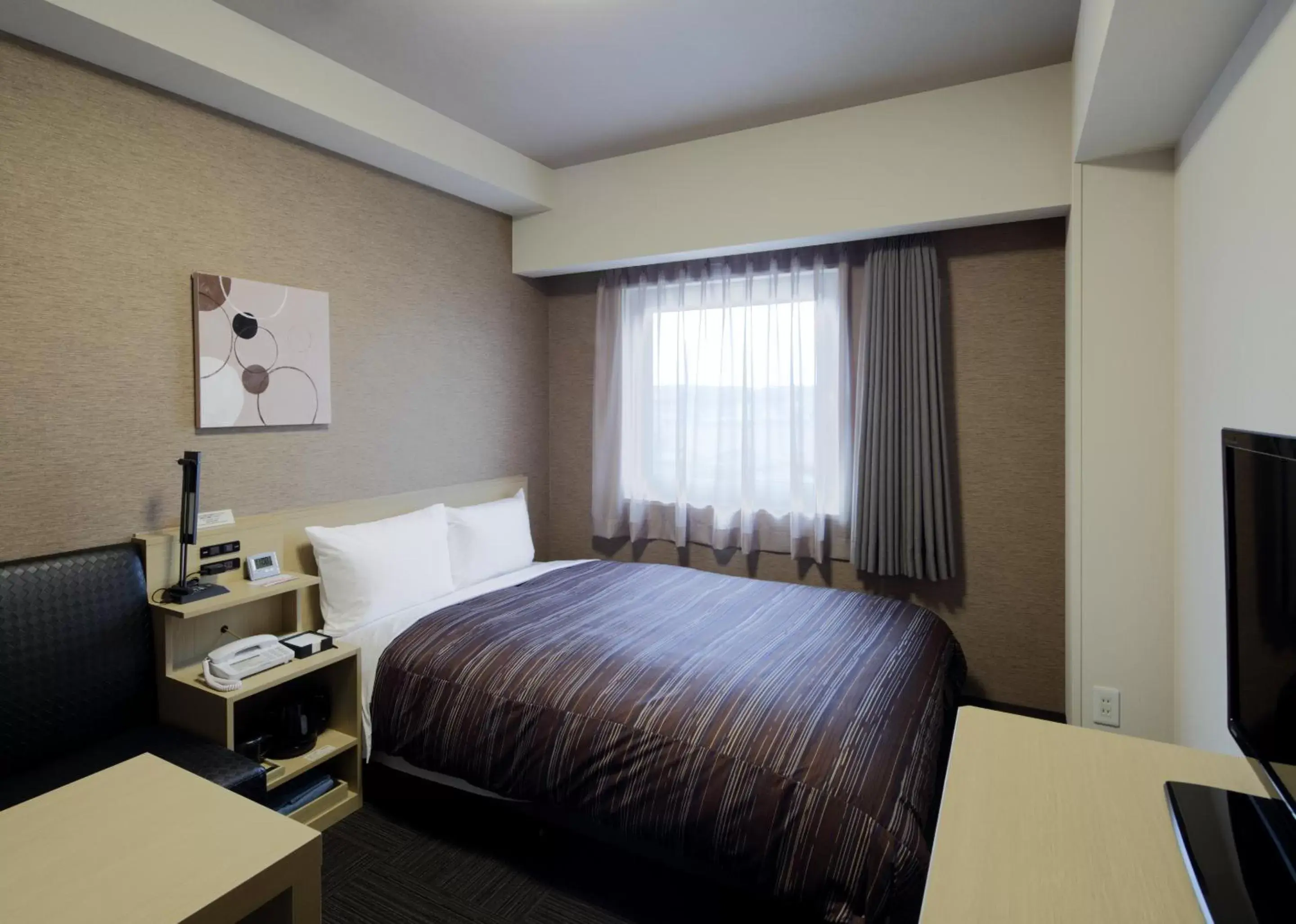 Bed in Hotel Route-Inn Hita-Ekimae