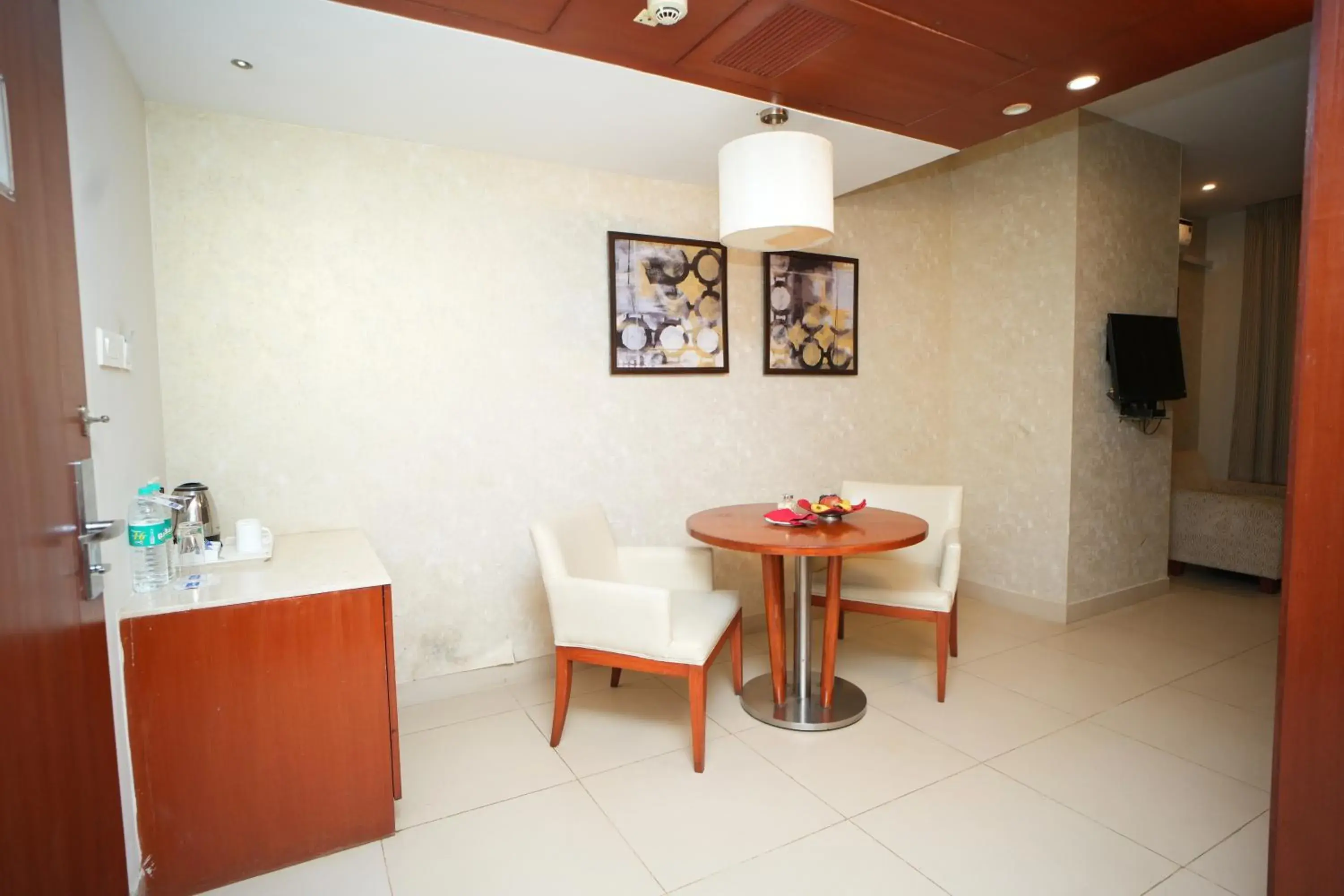 Living room, Dining Area in Siesta Hitech Hotel