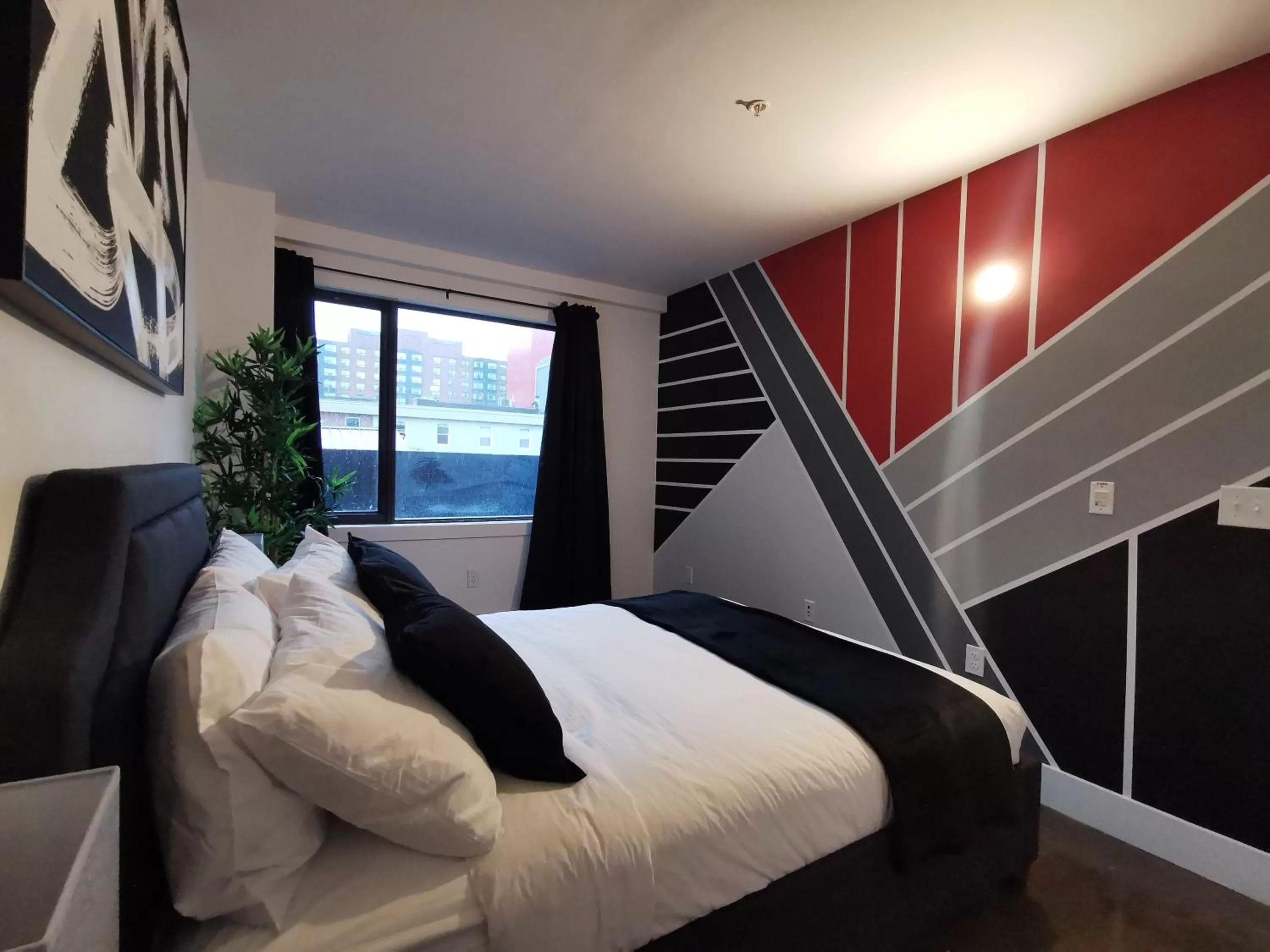 Bed in Cameo Hotel and Suites