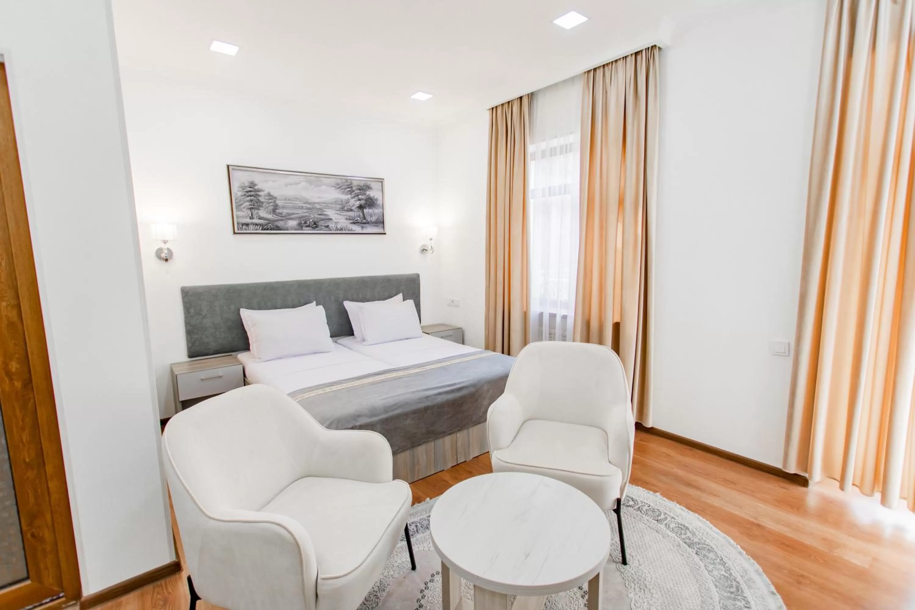 Bed in Registon Saroy Hotel