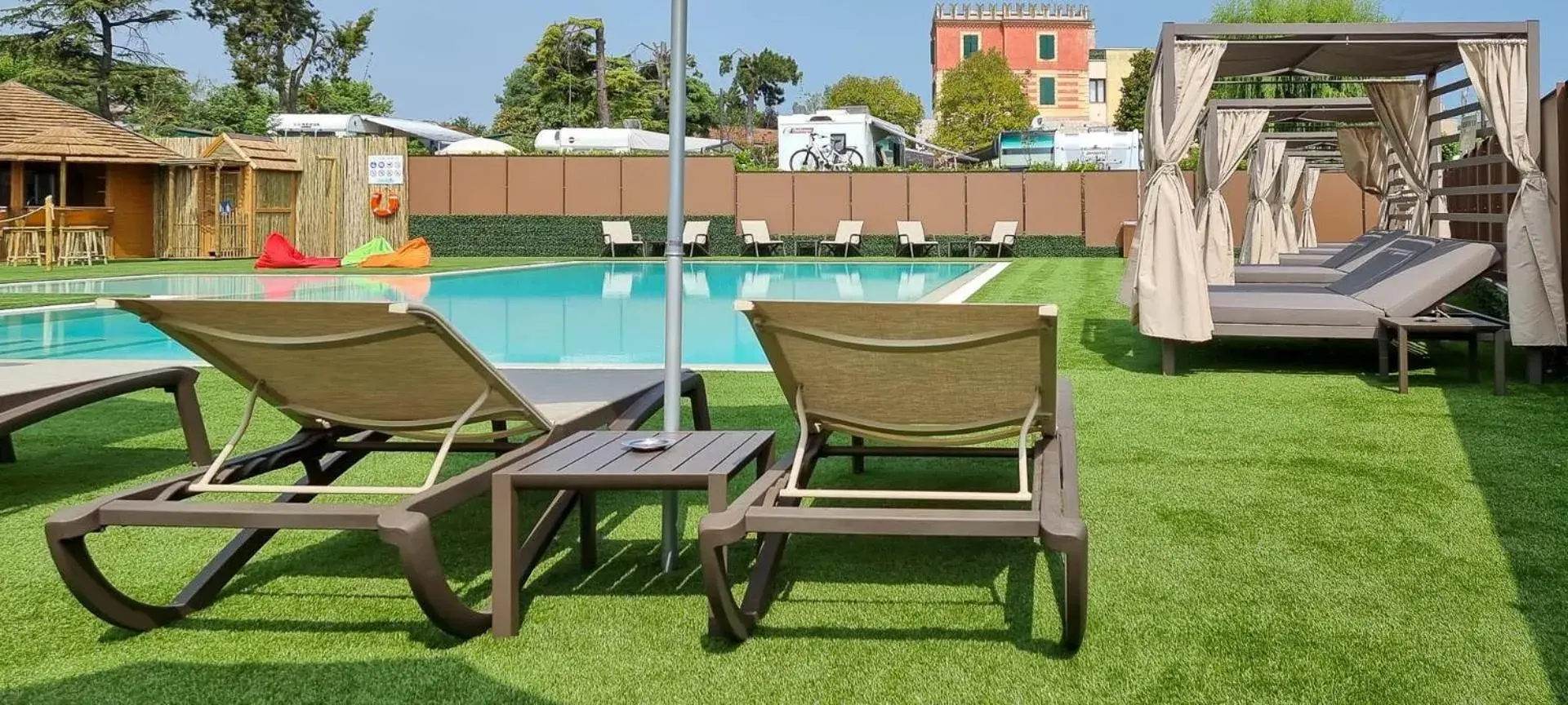 Patio, Swimming Pool in Hotel Puccini
