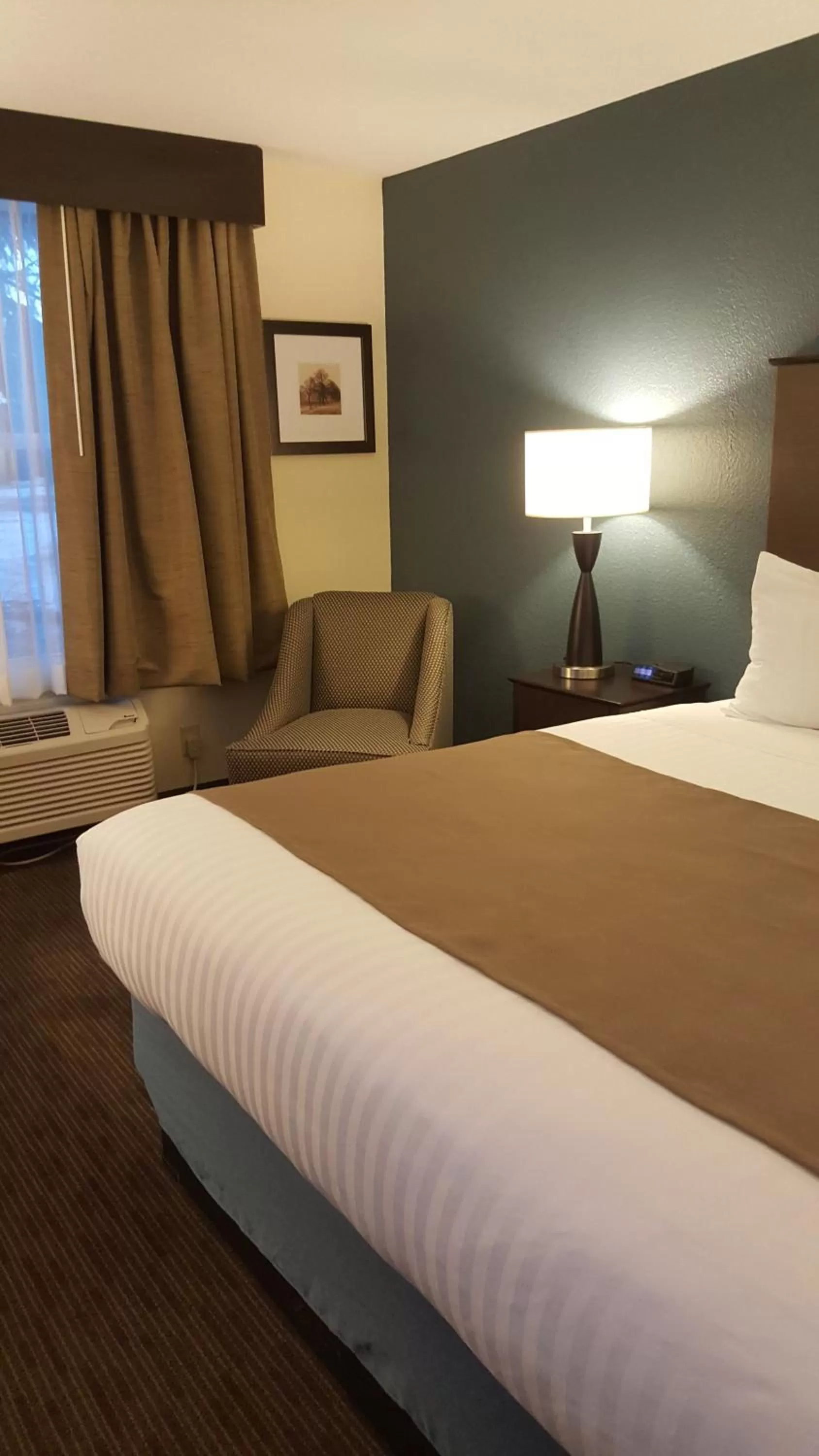 Bed in AmericInn & Suites Burnsville, MN