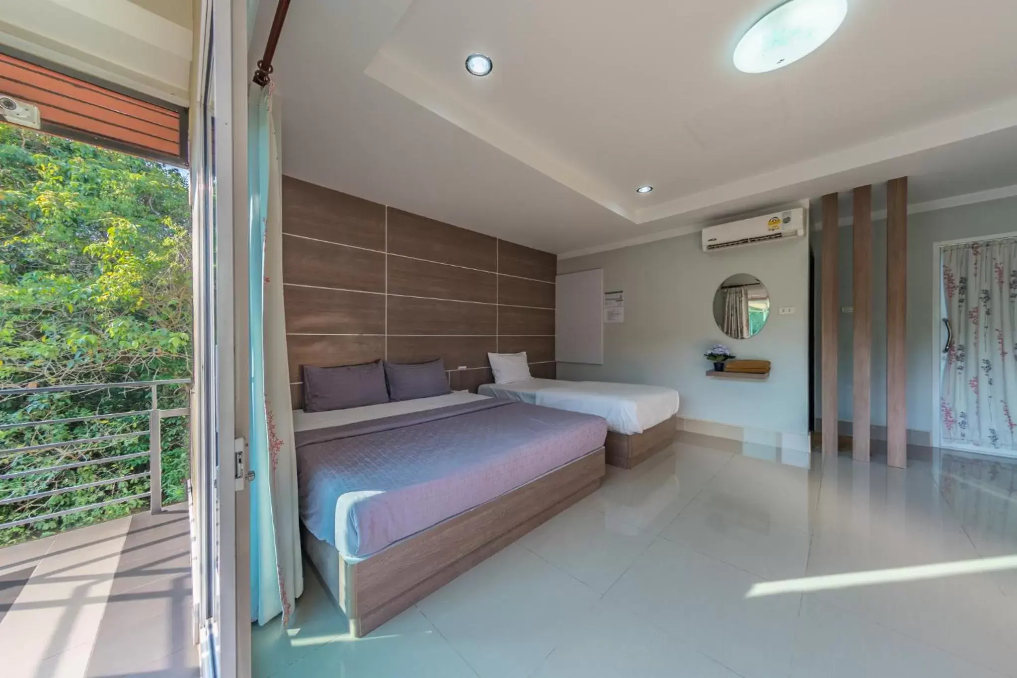 Photo of the whole room, Bed in Tachang Resort