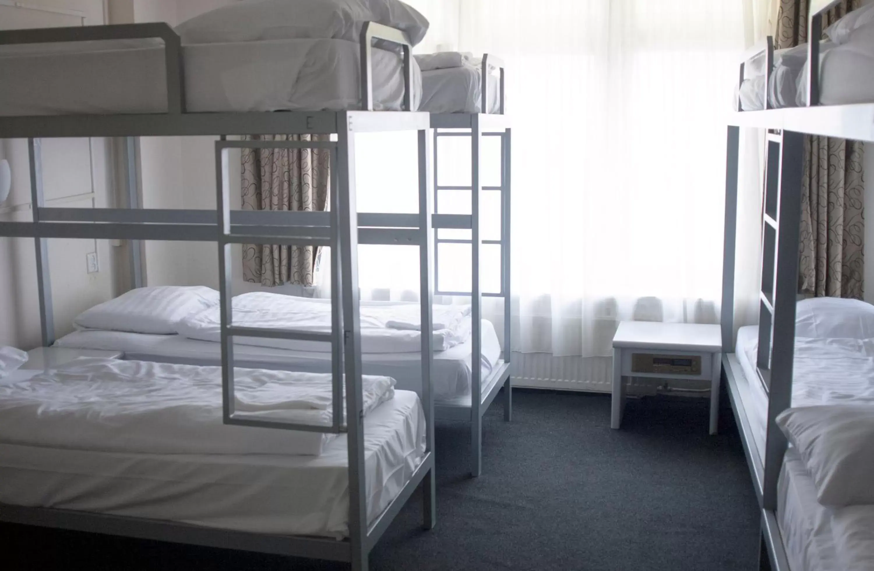 Bed, Bunk Bed in Budget Trianon Hotel
