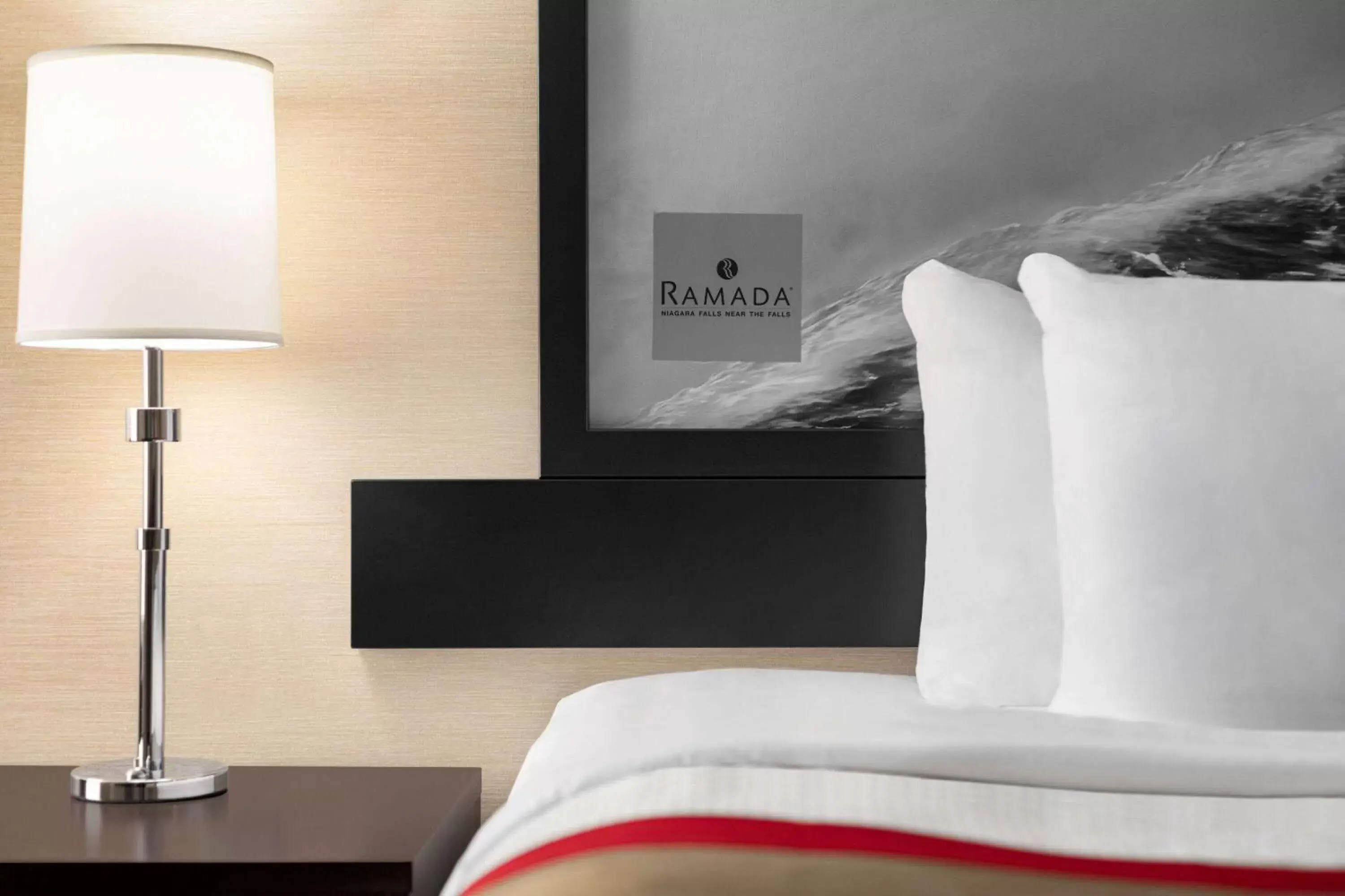 Photo of the whole room, Bed in Ramada By Wyndham Niagara Falls near the Falls