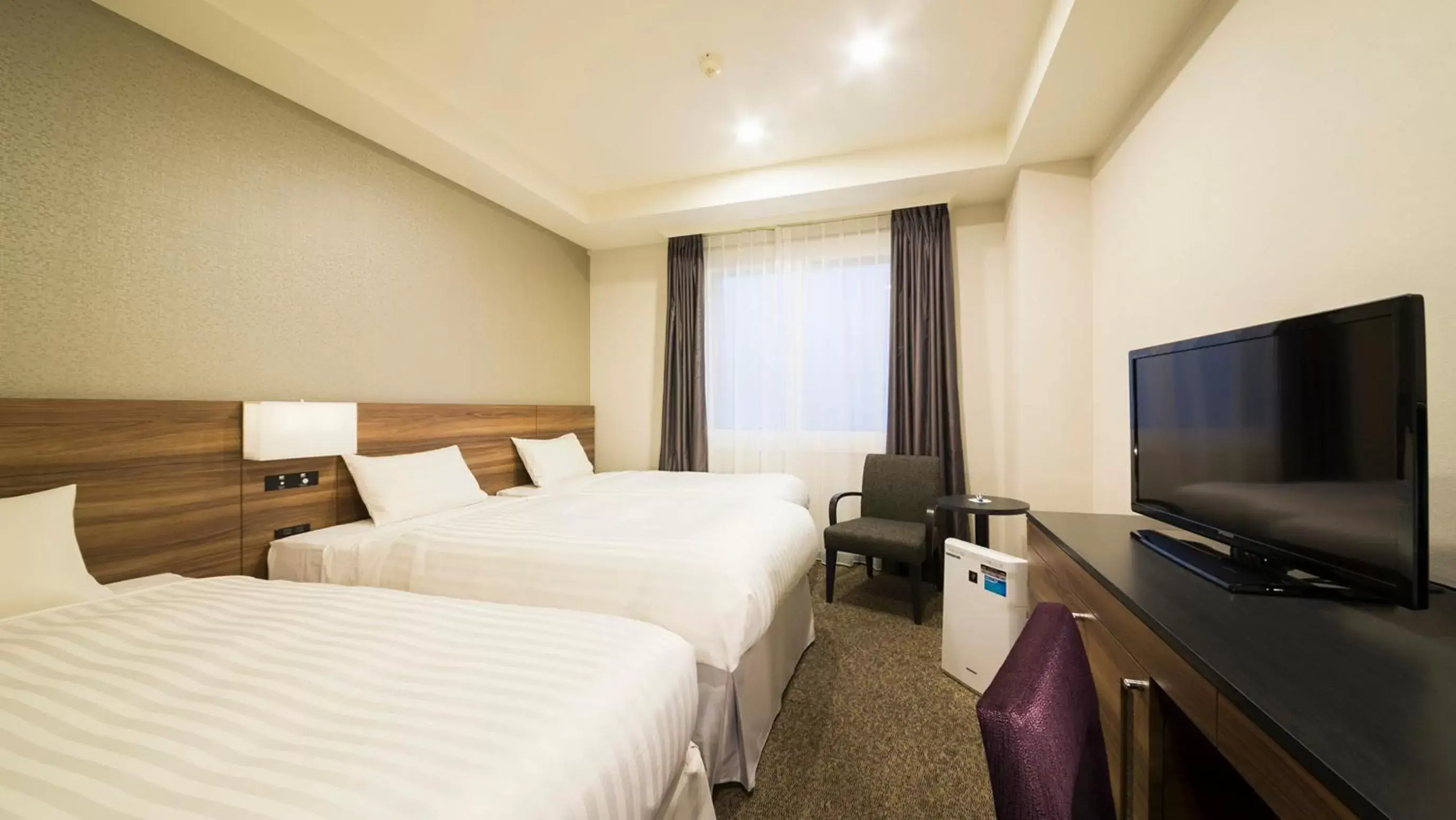 Bed in JR-East Hotel Mets Mito Bed in JR-East Hotel Mets Mito