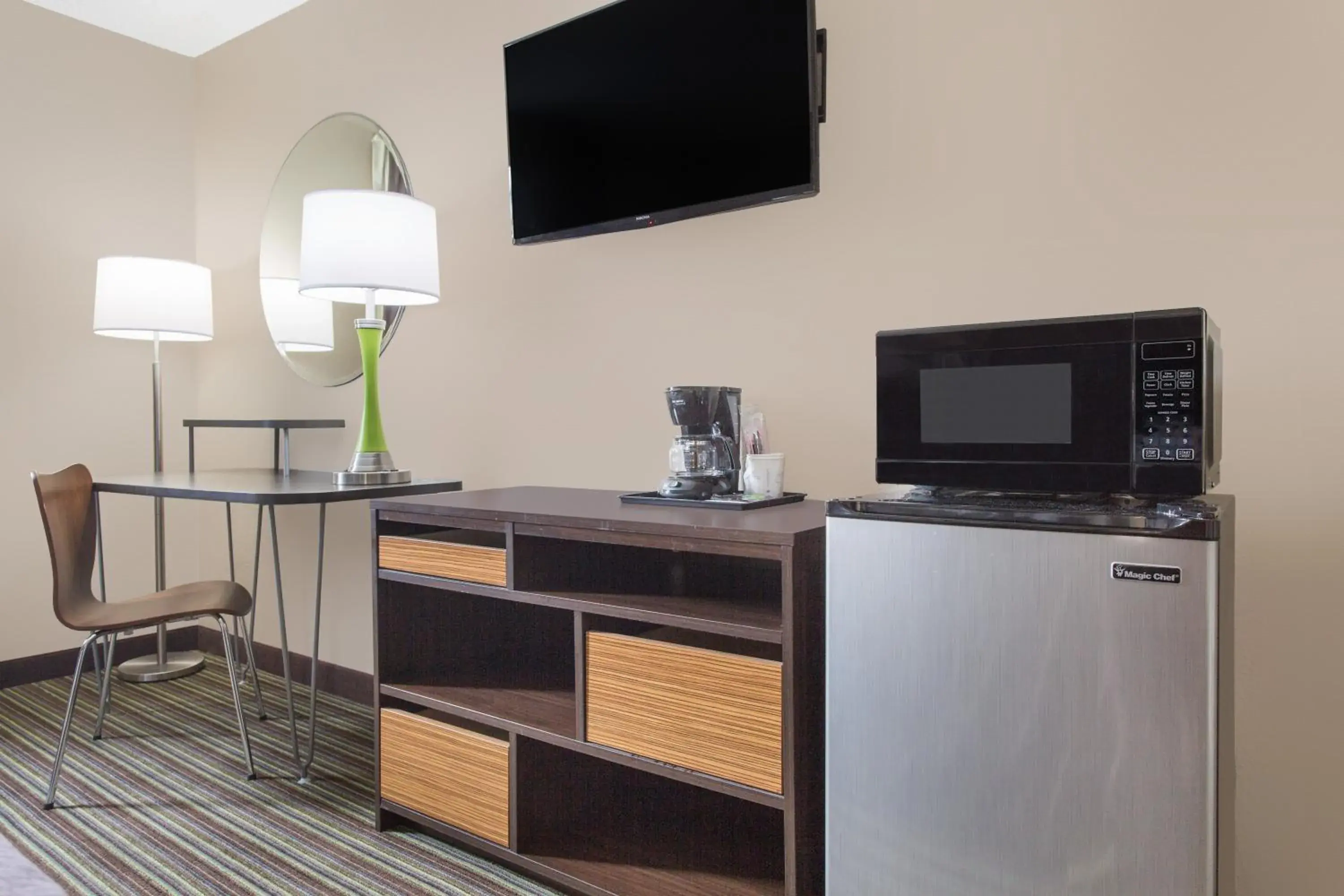 Photo of the whole room, TV/Entertainment Center in Super 8 by Wyndham Columbus Airport