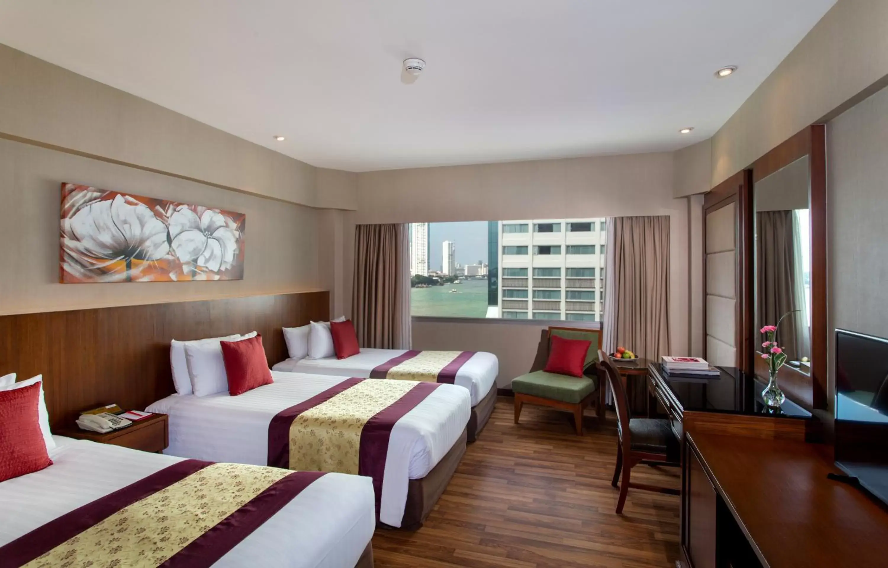 Deluxe Triple Room with River View in Ramada Plaza by Wyndham Bangkok Menam Riverside